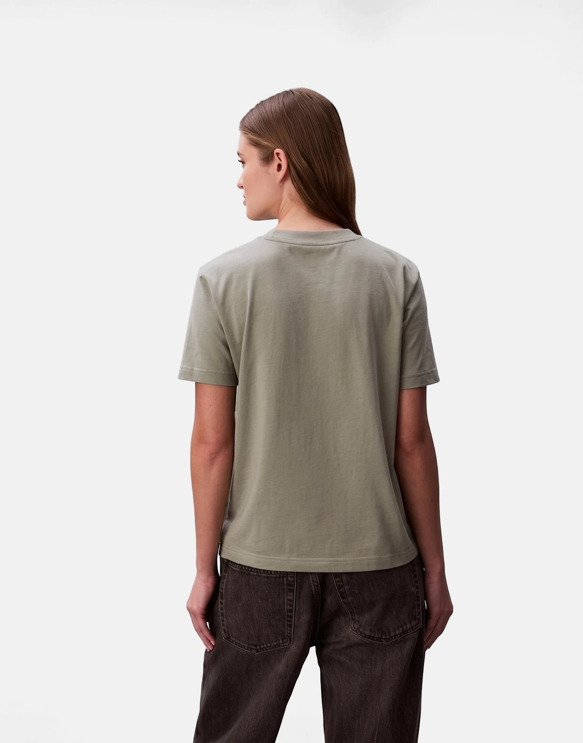 Female model wearing a Calvin Klein A-Inst Logo Classic Grey T-shirt, seen from the back.