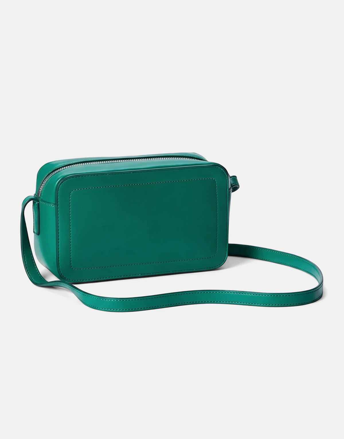 Calvin Klein Bold CK green structured camera bag with a long strap, viewed from the side on a plain background.