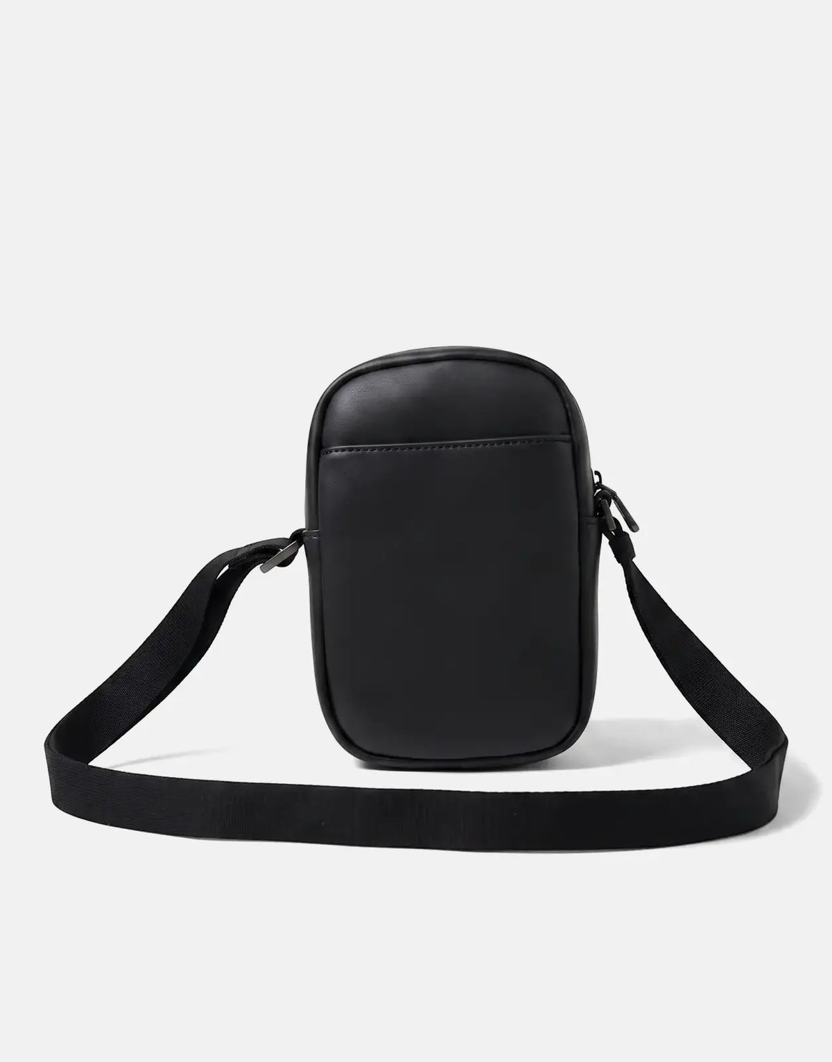 Calvin Klein Bold Slim Black Reporter Bag made from synthetic material, viewed from the front with its adjustable strap.