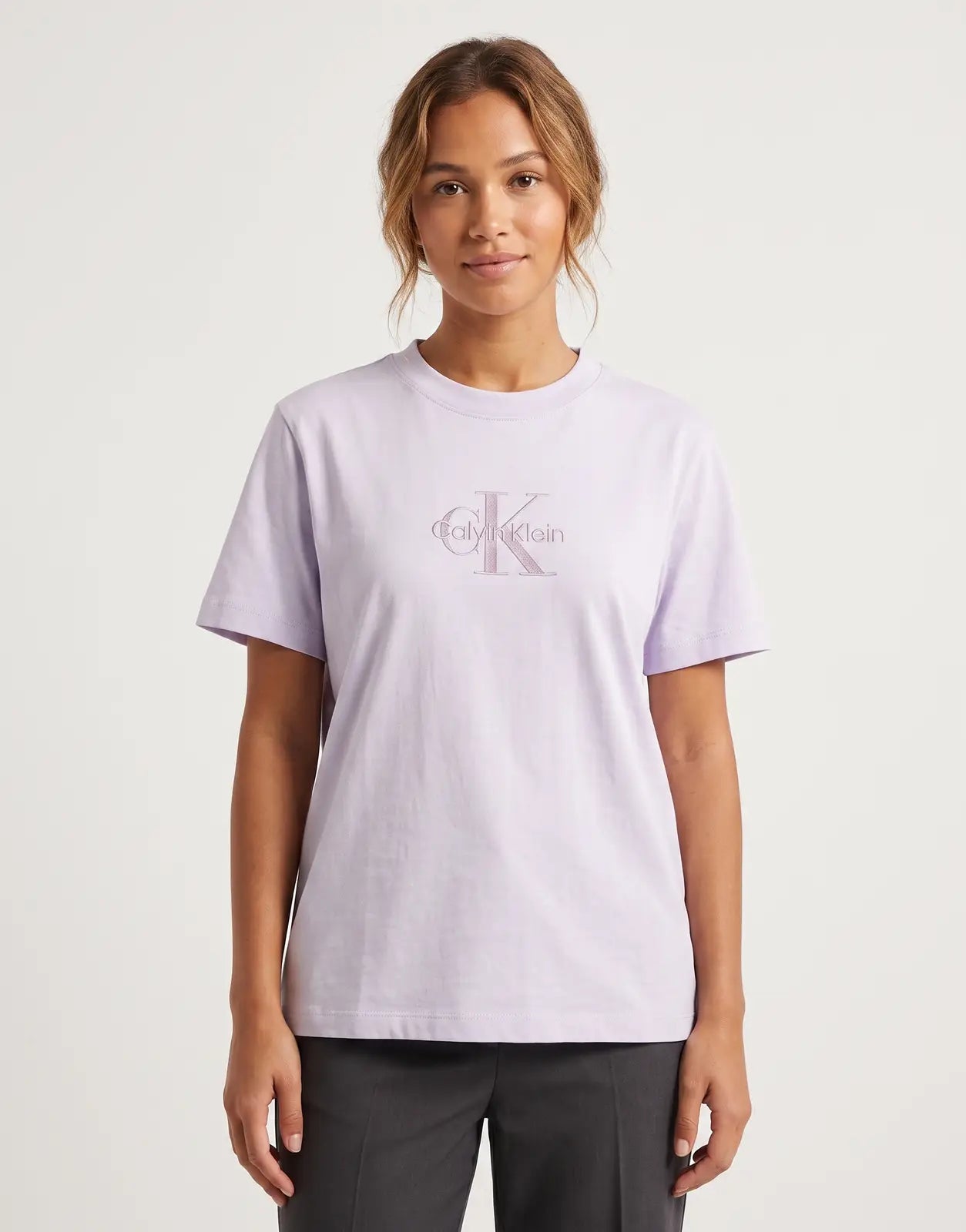 A lilac Calvin Klein Classic Monologo short sleeve t-shirt, featuring a crew neck and the distinctive brand logo. Laid flat