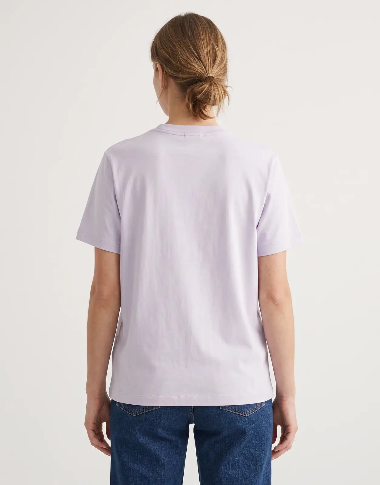 Calvin Klein Classic Monologo Lilac T-Shirt, back view, made from soft cotton jersey fabric, ideal for everyday comfort.