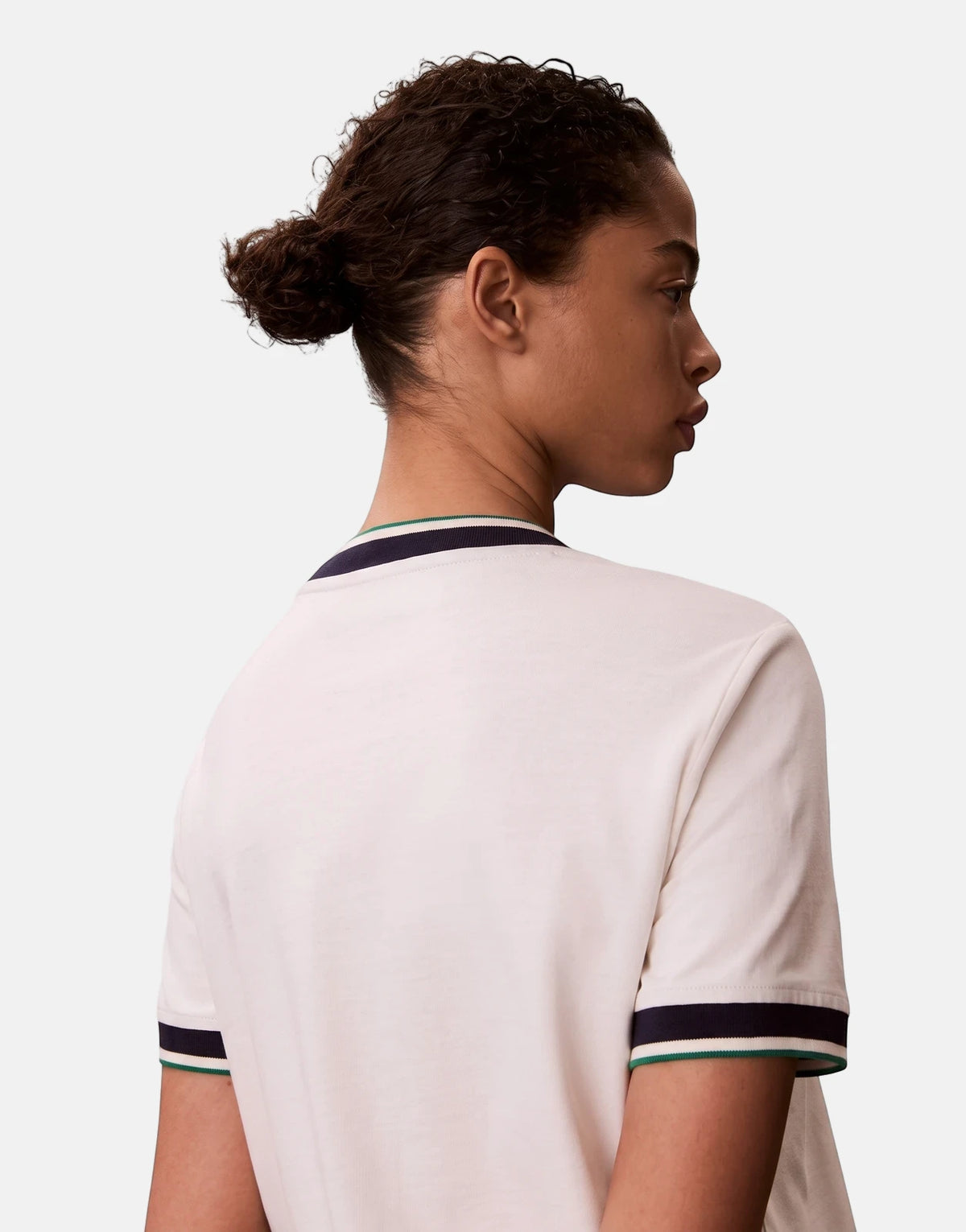 Calvin Klein CTN Monogram Stripe Trim Offwhite Mini Dress worn by a model, featuring striped collar and sleeve cuffs.