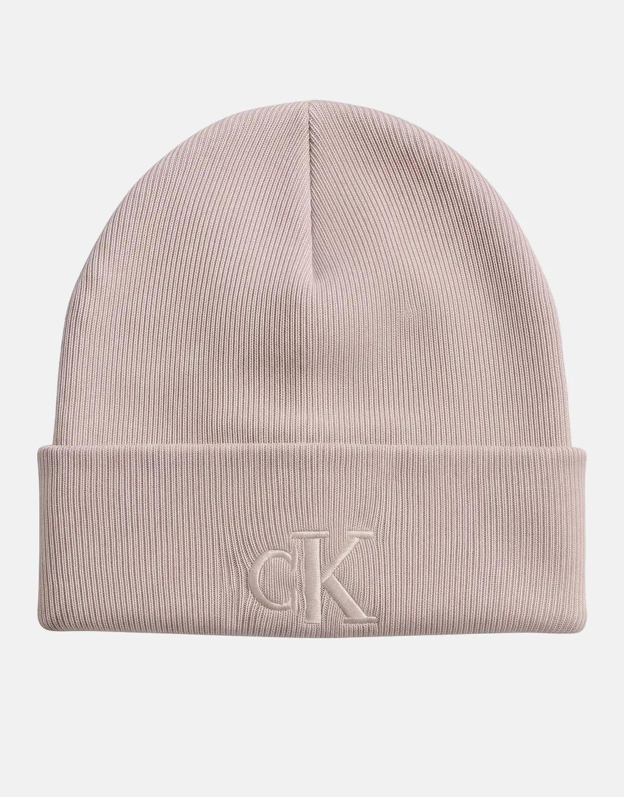 Close-up of a Calvin Klein Fine Rib Beanie in beige, featuring the embroidered 'CK' logo on its ribbed cuff.