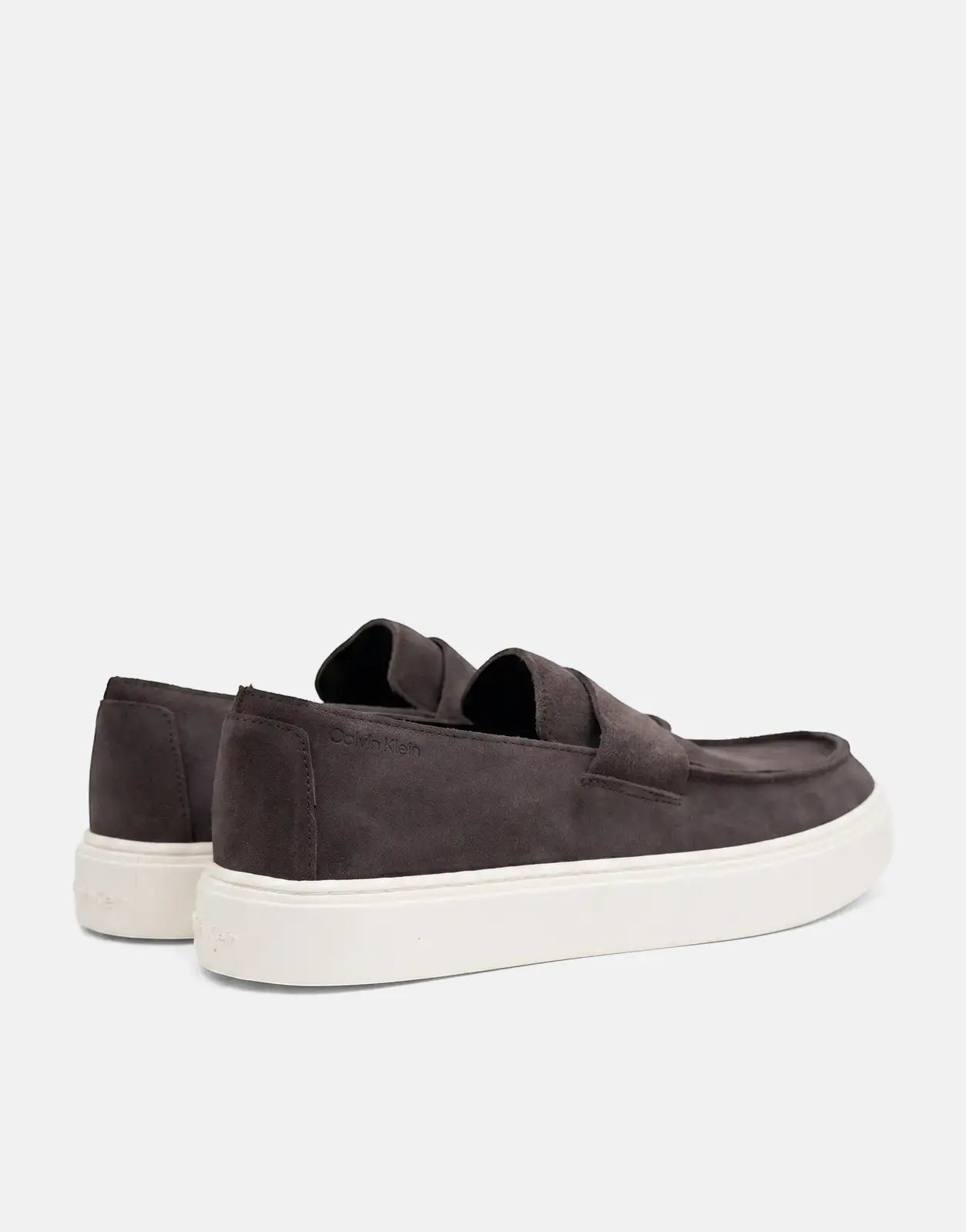 Dark brown suede Calvin Klein Hybrid Clean Cup platform loafers, showing the rear-quarter view with white soles.