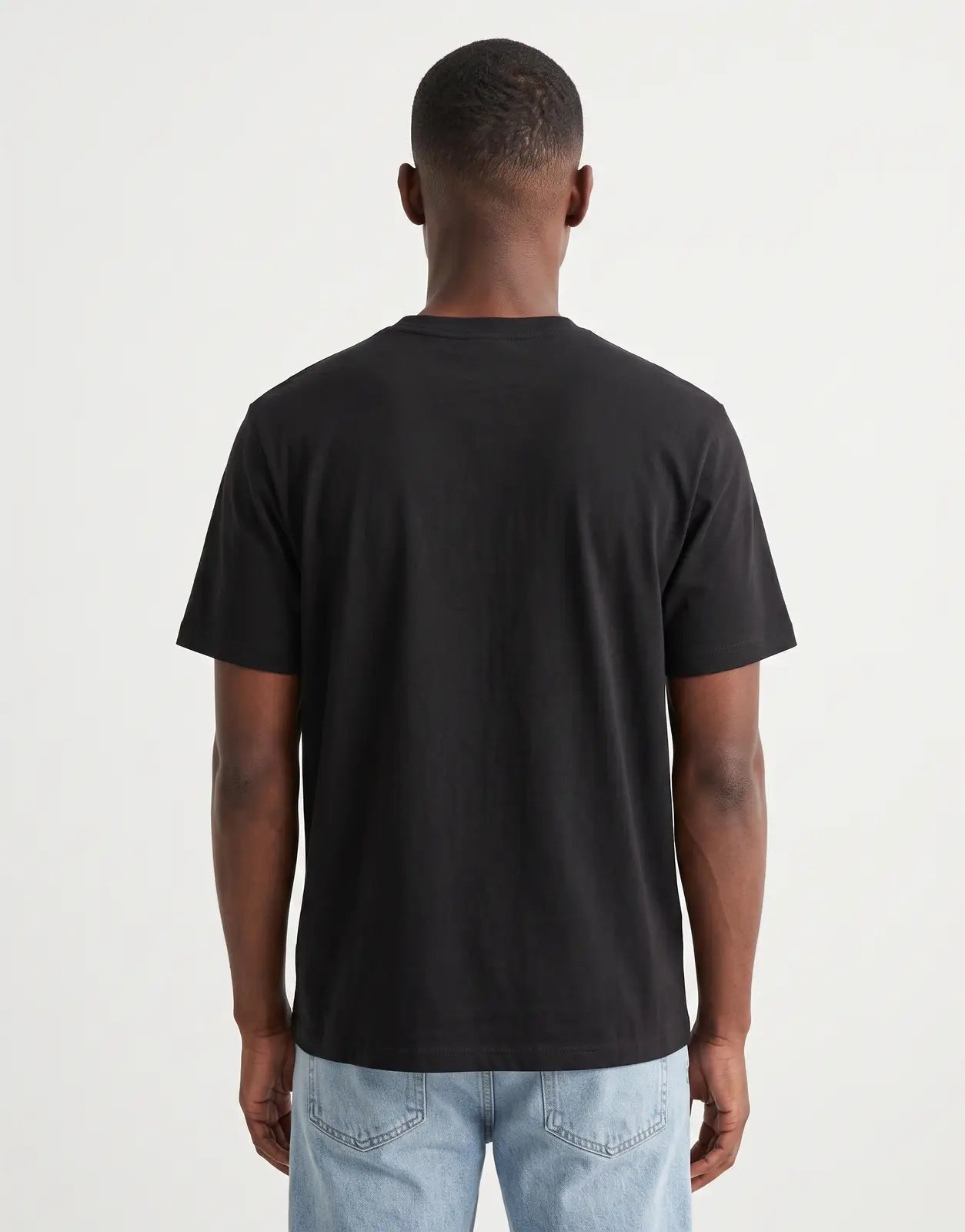 Black Calvin Klein 20s March Graphic Seasonal Fashion T-shirt for men, shown from the back, made of soft cotton fabric.