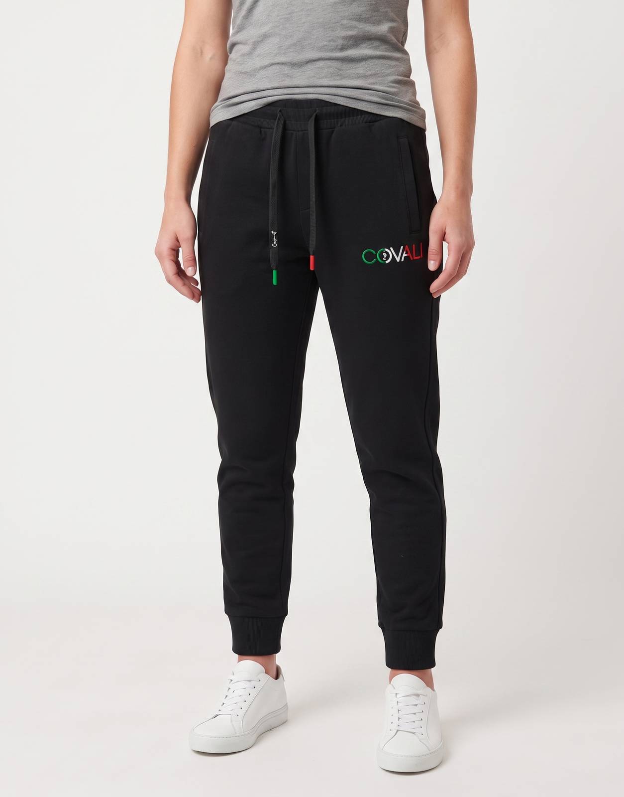Black Covali Italiano-Sp sweatpants for women, featuring a front view with a logo, worn by a model.
