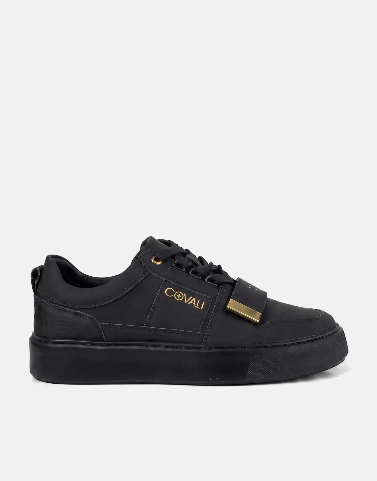 Covali Moda black sneakers with gold logo and strap detail, presented in a side profile view on a clean background.