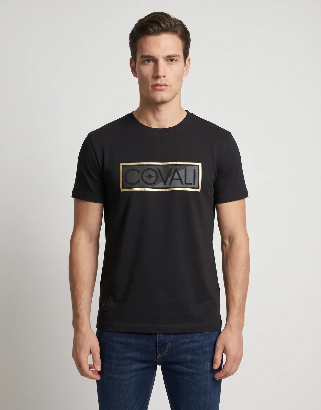 A men's Covali Scato Black T-Shirt, featuring short sleeves and a crew neck, with a gold-framed black 'COVALI' logo on the