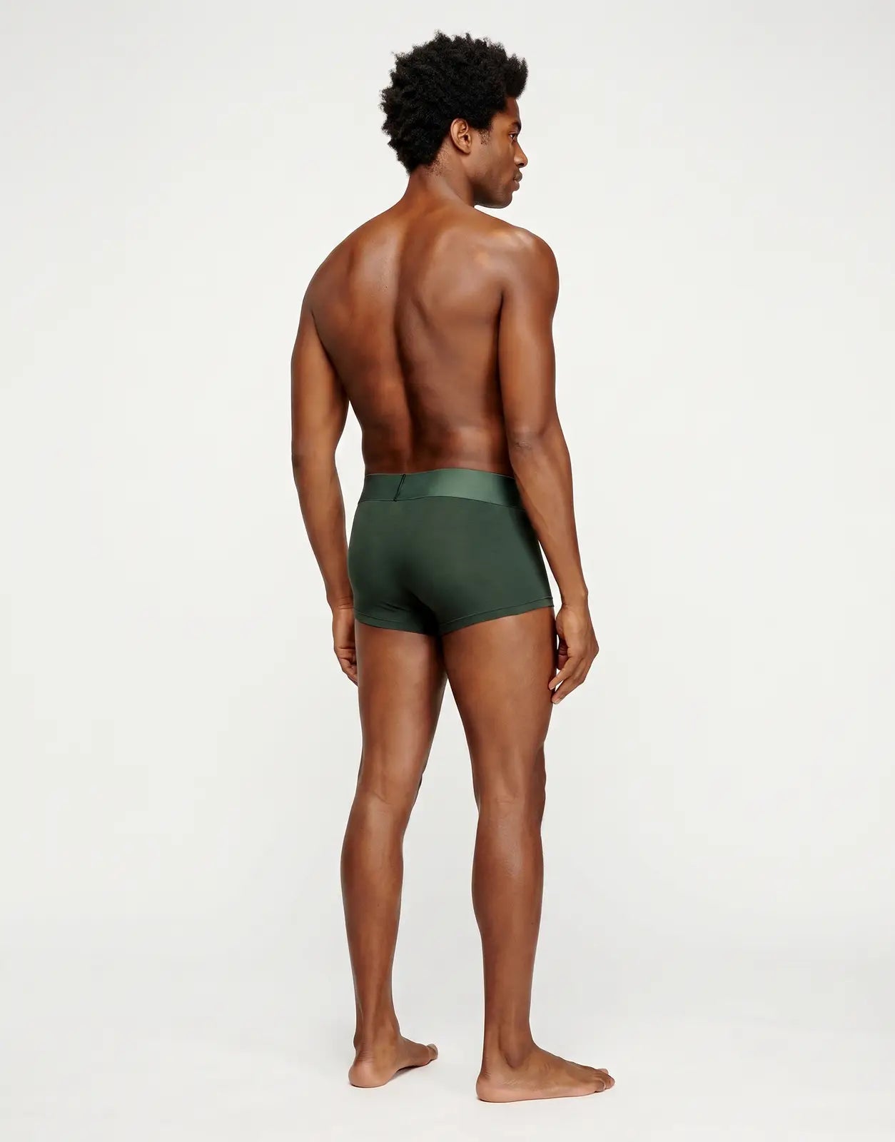 Men's Diesel Damien D Pop Boxer Shorts E7498 in dark green, made from a soft jersey fabric, shown from the back on a model.