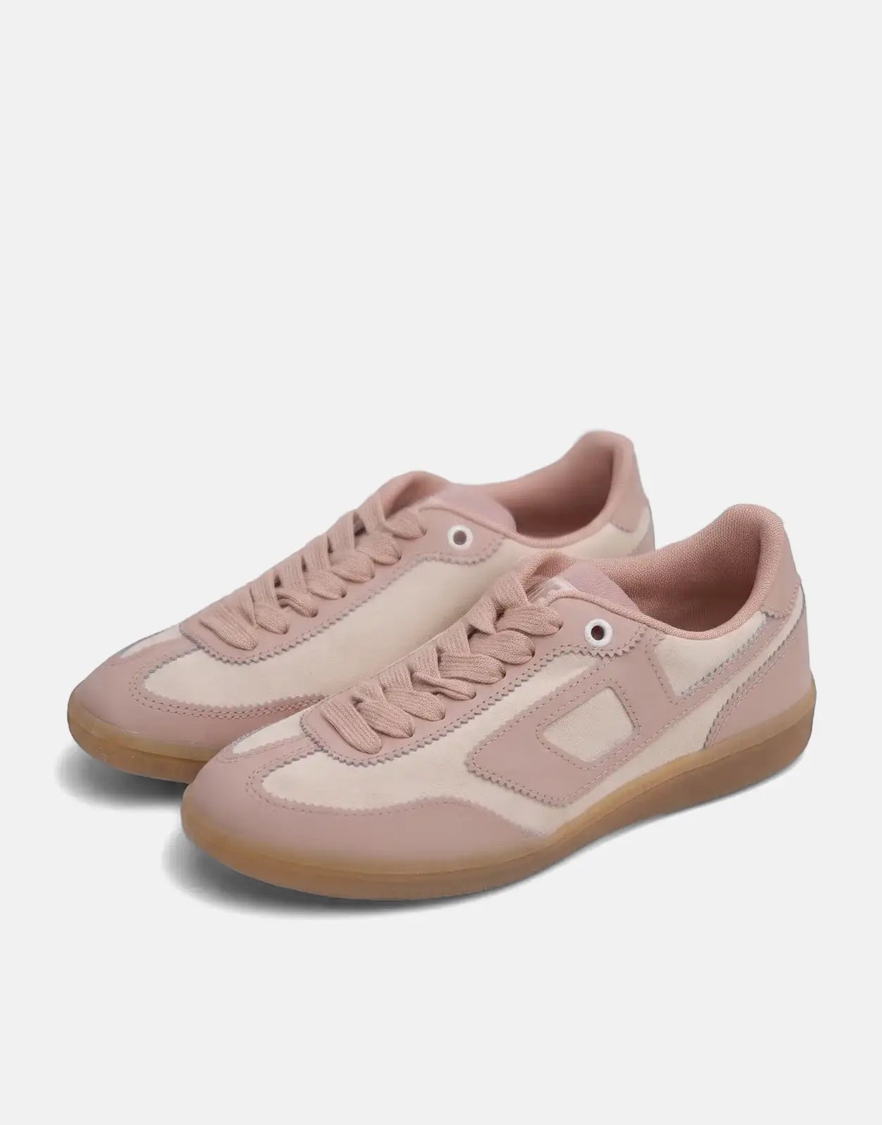 A pair of Diesel S-D-Matcha low sneakers in pink and beige, featuring suede panels and gum rubber soles, angled slightly.