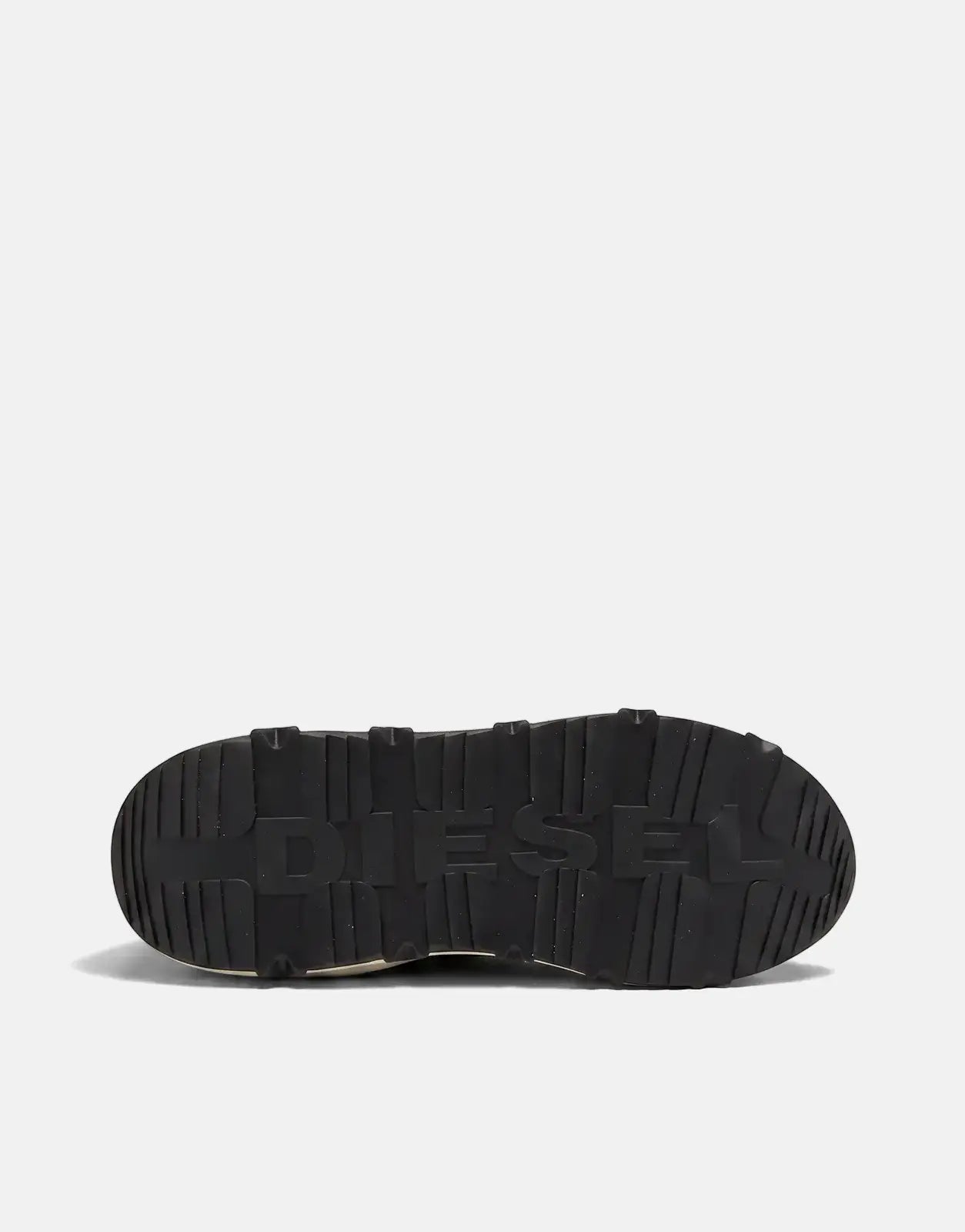 Bottom view of a black Diesel Savannah Tulu sneaker sole with an embossed DIESEL logo and rugged tread pattern.