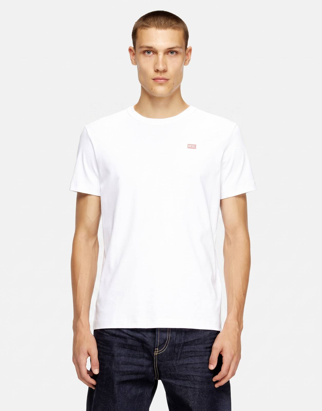 White Diesel T-Miegor K77 men's short sleeve crew neck t-shirt with red Diesel logo on the chest.