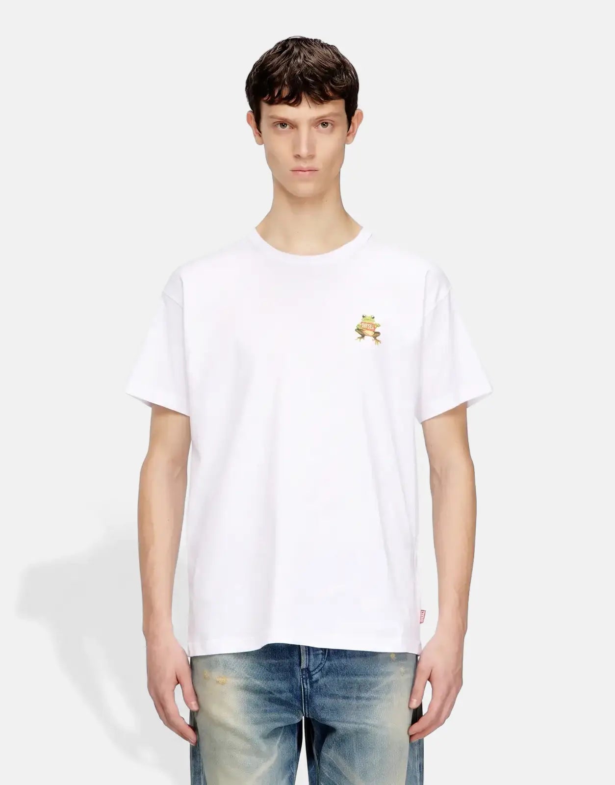 Men's white Diesel T-Norm Frog Regular T-Shirt with a green frog graphic, shown on a model wearing blue jeans.