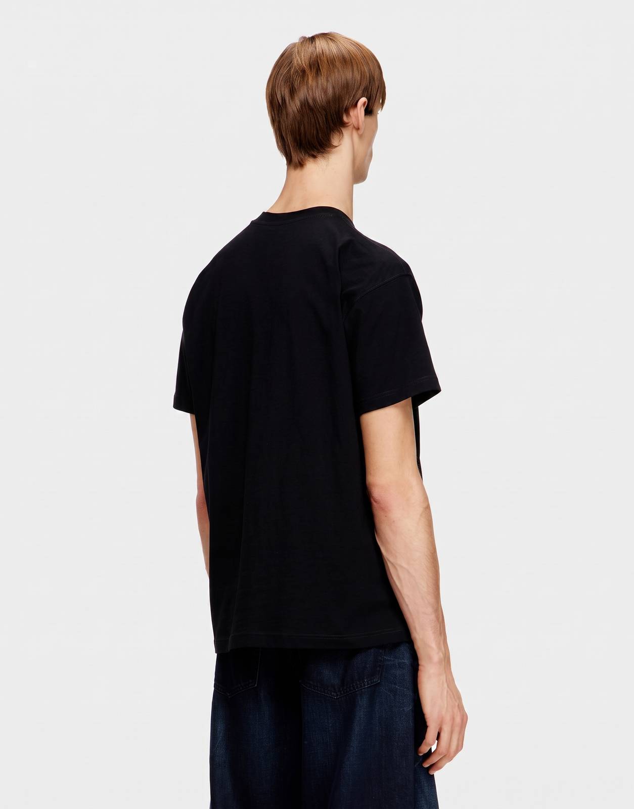 Black Diesel T-Norm V10 Regular T-Shirt 9XX for men, featuring a classic crew neck and short sleeves, displayed from the