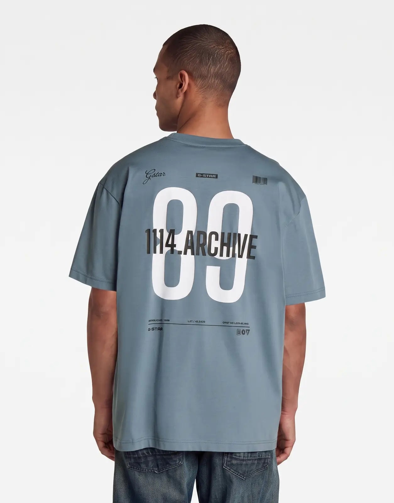 Men's G-Star RAW 89 Back Graphic Relaxed Grit T-Shirt in blue-grey, shown from the back with distinctive white '89' print.