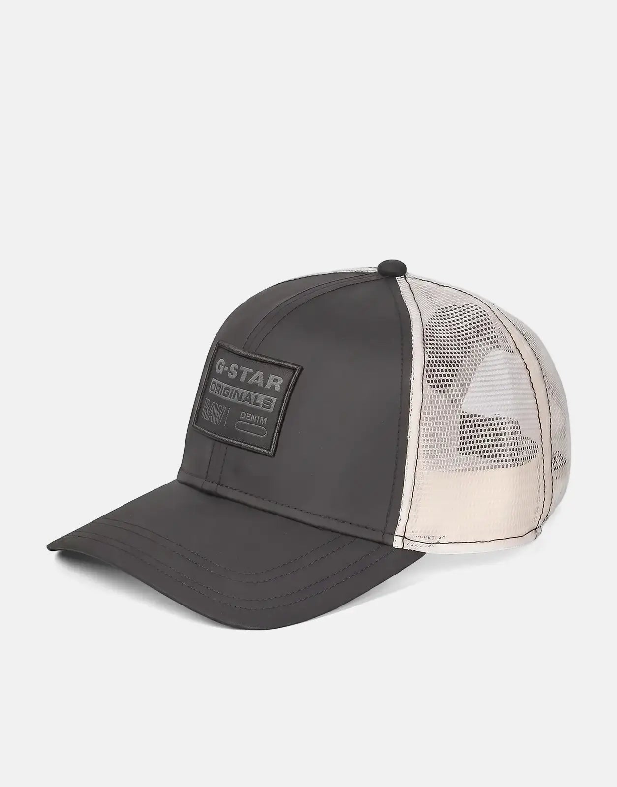 G-Star RAW Baseball Dark Black Trucker Cap, featuring a solid front panel and white mesh back, resting on a clean surface.