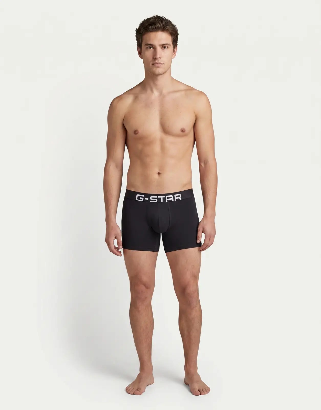 Black G-Star RAW men's boxer briefs, part of a 3-pack, featuring the prominent white G-STAR logo on the dark elastic