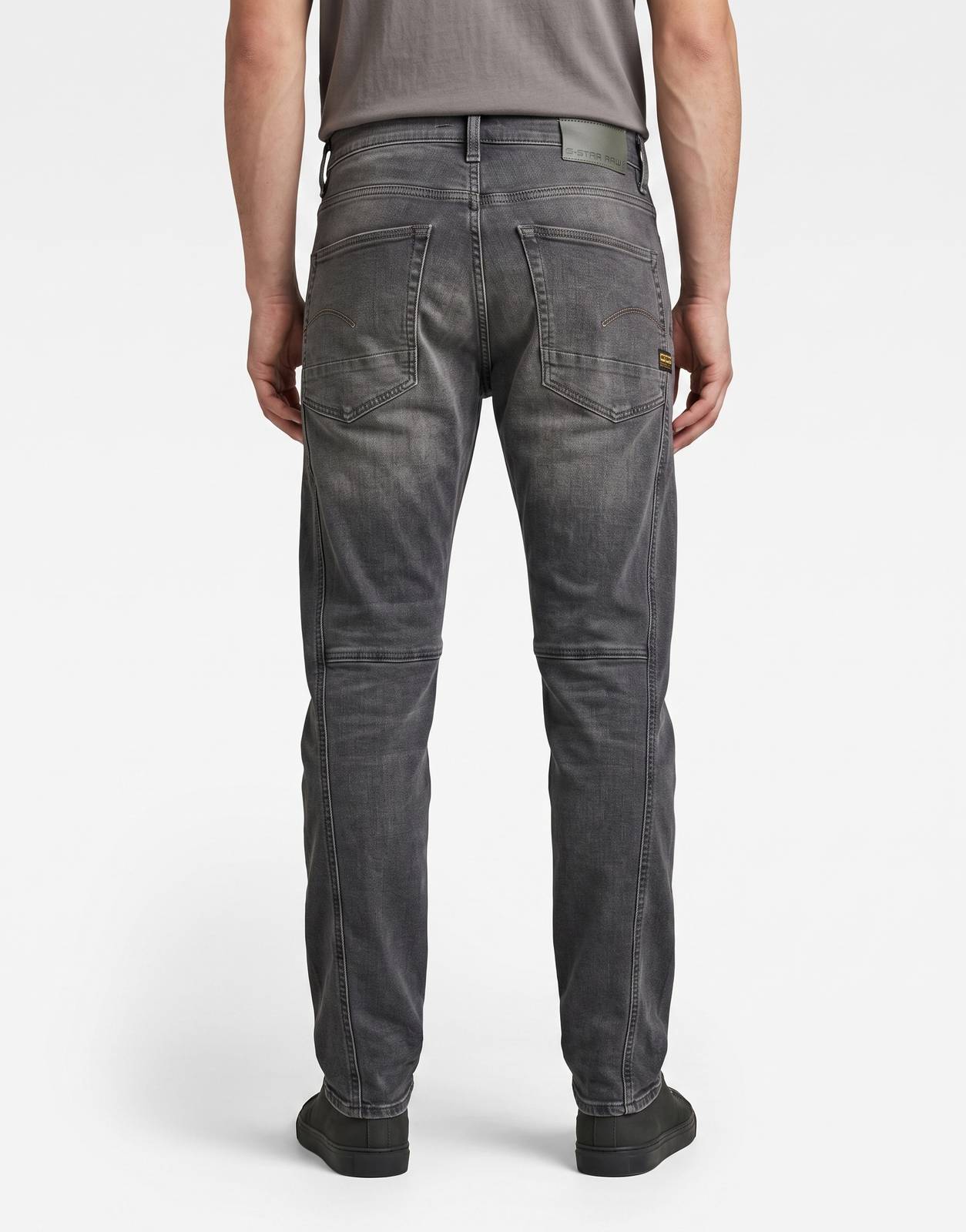 Back view of G-Star RAW Contor 3D Slim Faded Saunders Rocks men's jeans in faded dark gray denim, with distinctive knee