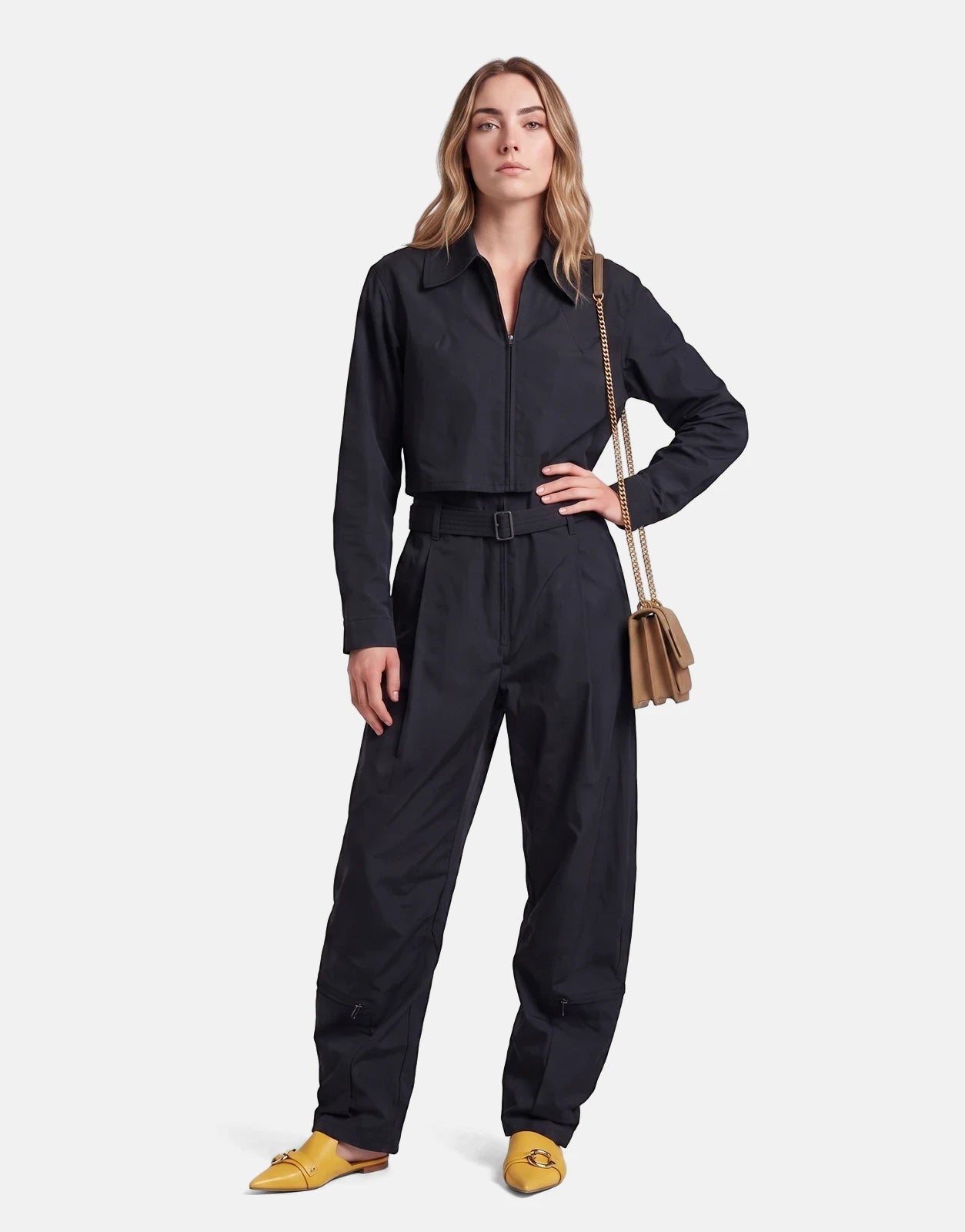 G-Star RAW Fightsuit Salute Jumpsuit in black on a female model. Full-body view, showing the belted waist and cargo details.
