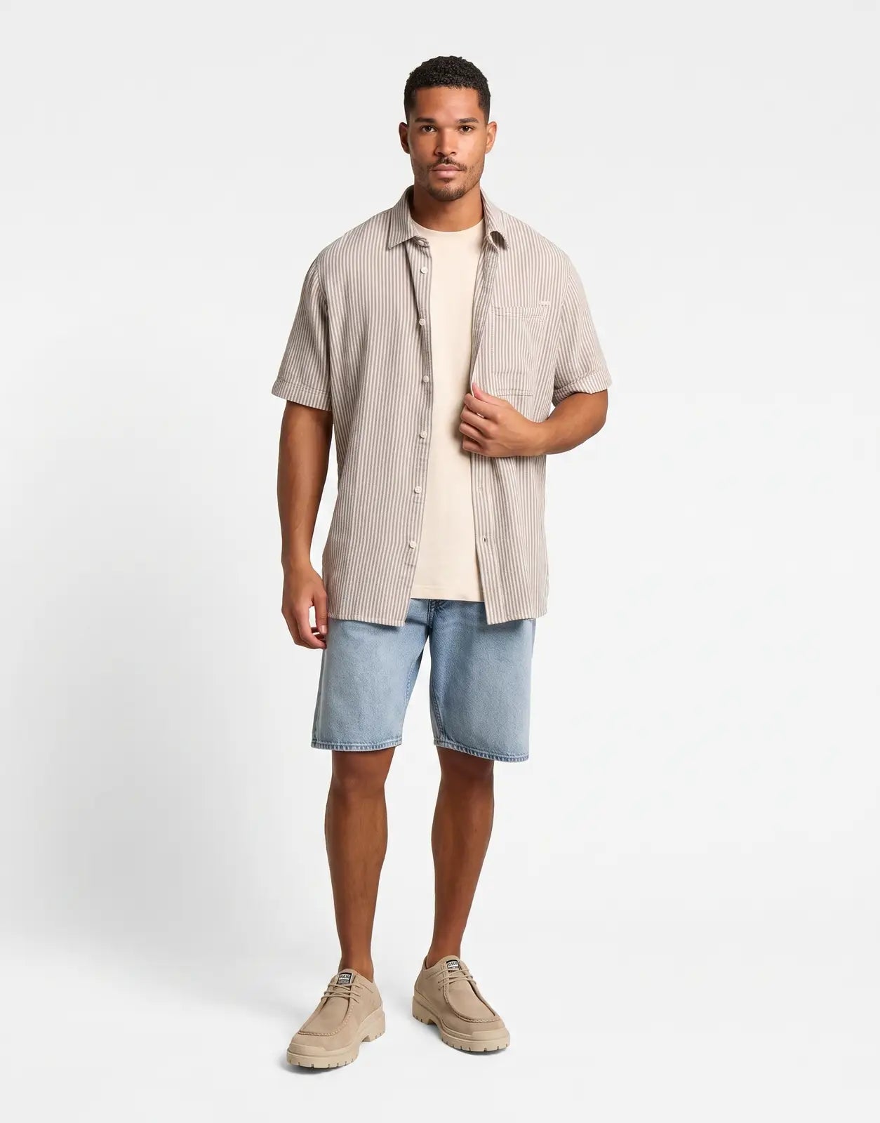 Front view of a male model wearing a G-Star RAW One Pocket Regular Rank Blue Slim Stripe Shirt with short sleeves and a
