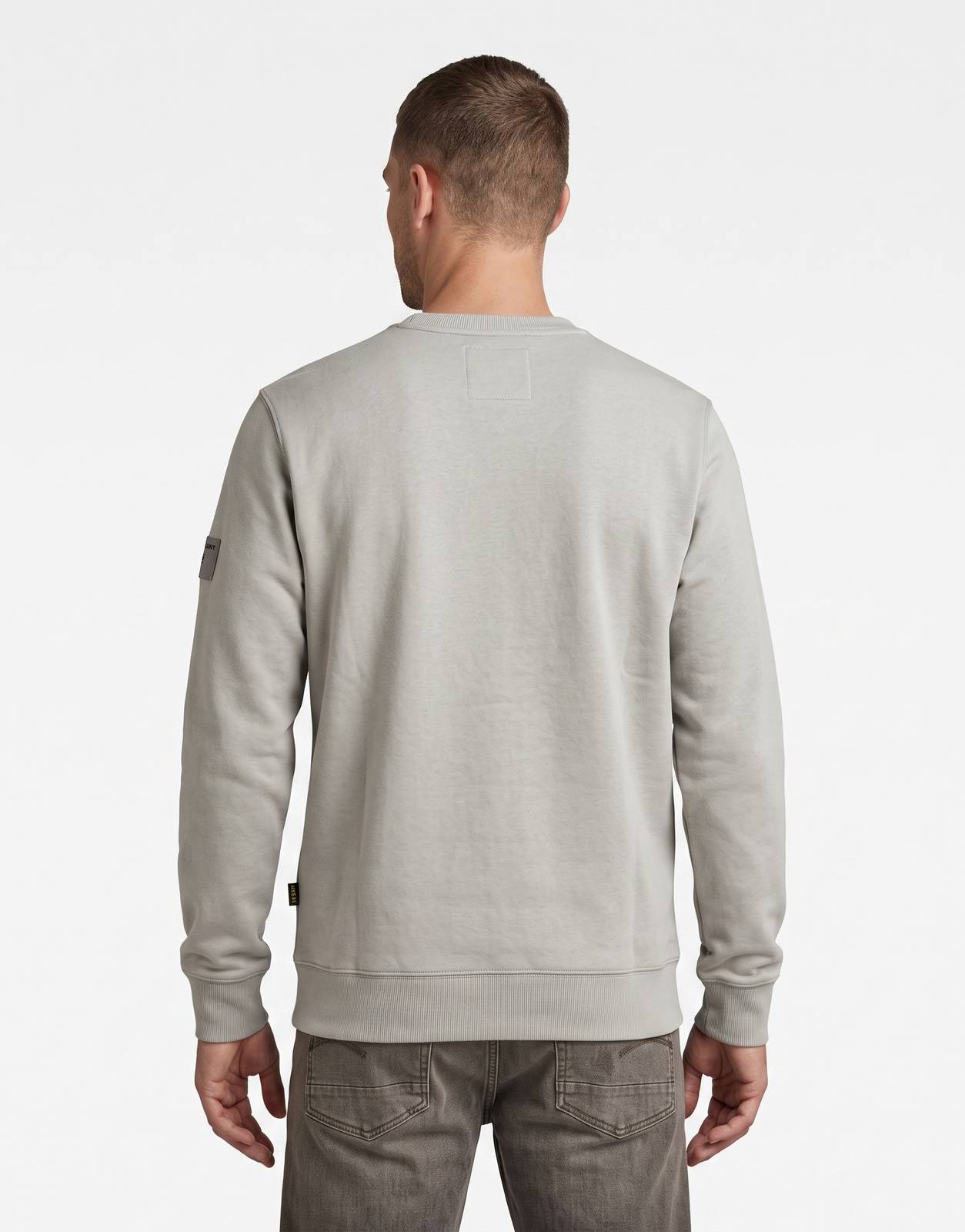 Back view of a G-Star RAW Regular Fit Wild Dove Sweatshirt for men, made from soft cotton fabric, featuring ribbed cuffs and