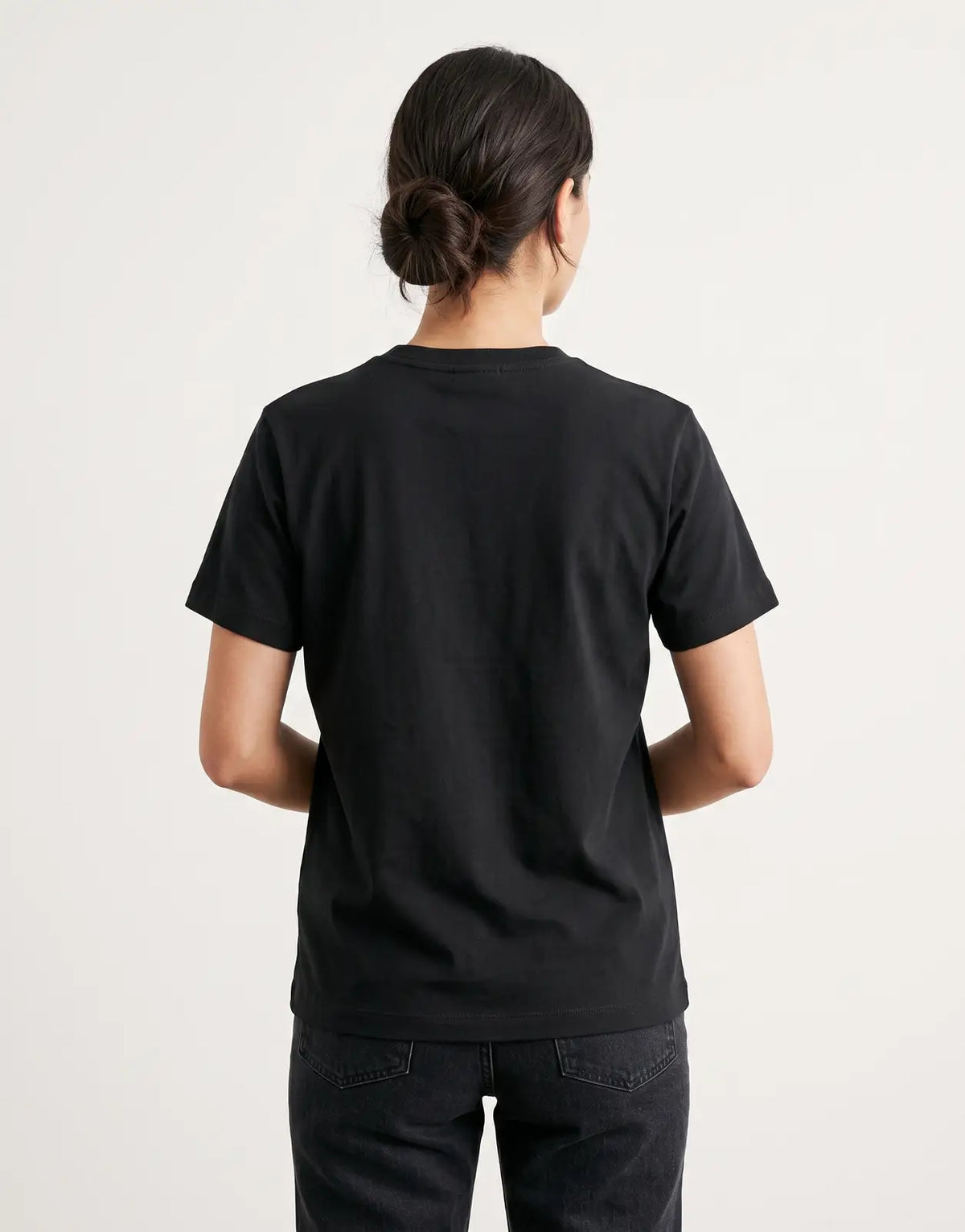 G-Star RAW Unit Dark Black T-shirt, presented from the back, highlighting its solid black color and classic short-sleeve