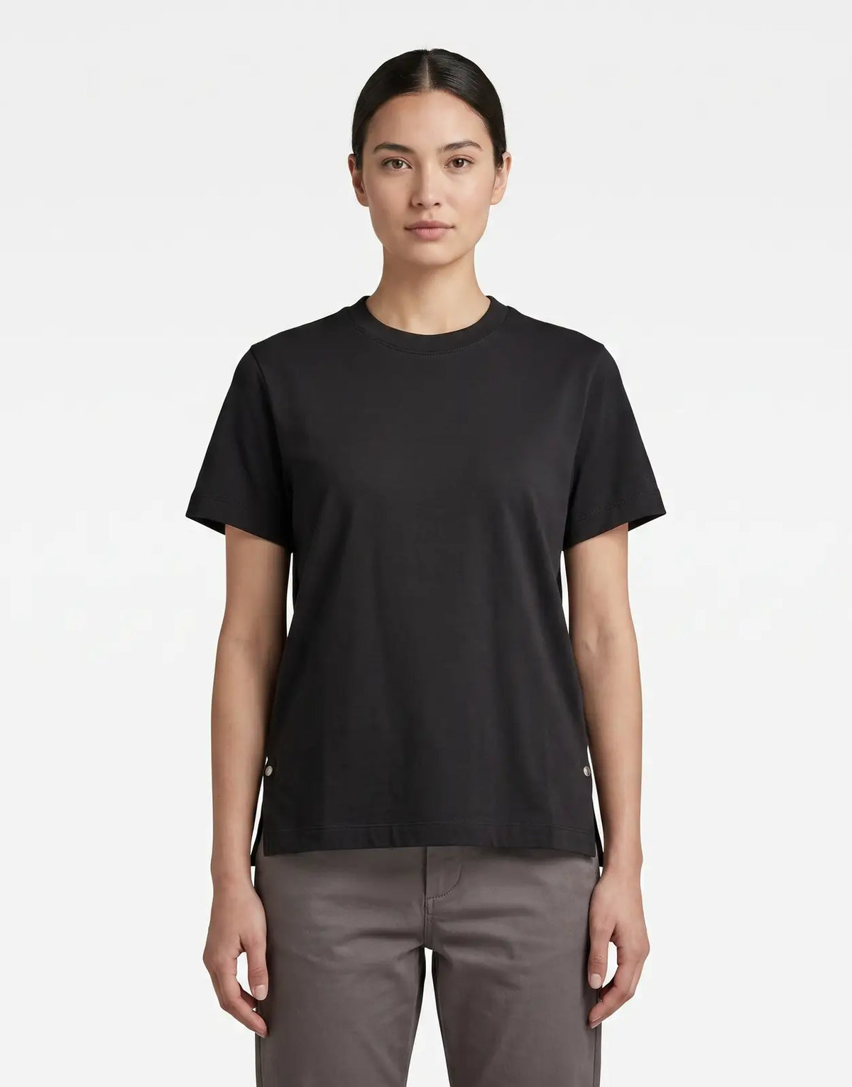 G-Star RAW Unit Dark Black T-Shirt with a crew neck, short sleeves, and side slits with silver snap buttons, displayed flat.
