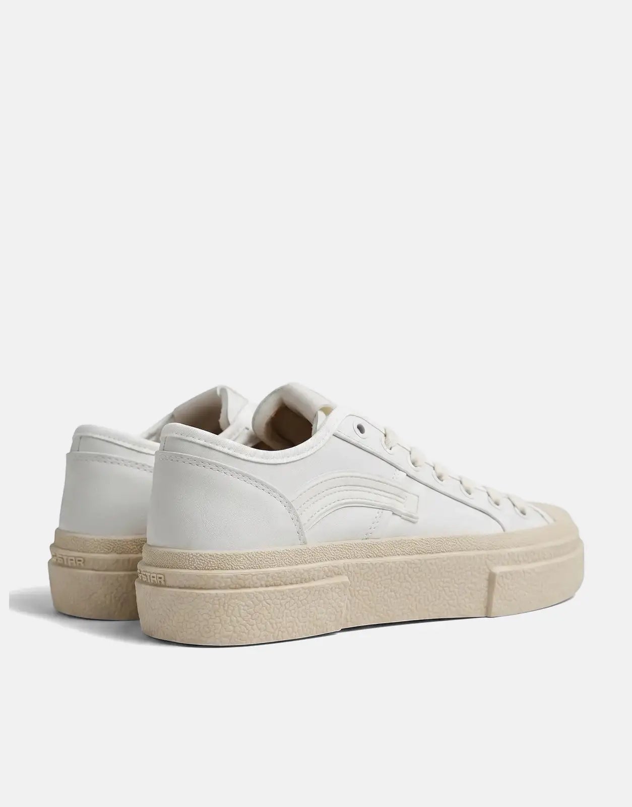 G-Star RAW Vodan Low Lea white sneakers with chunky beige platform soles, shown in an angled side-rear view.