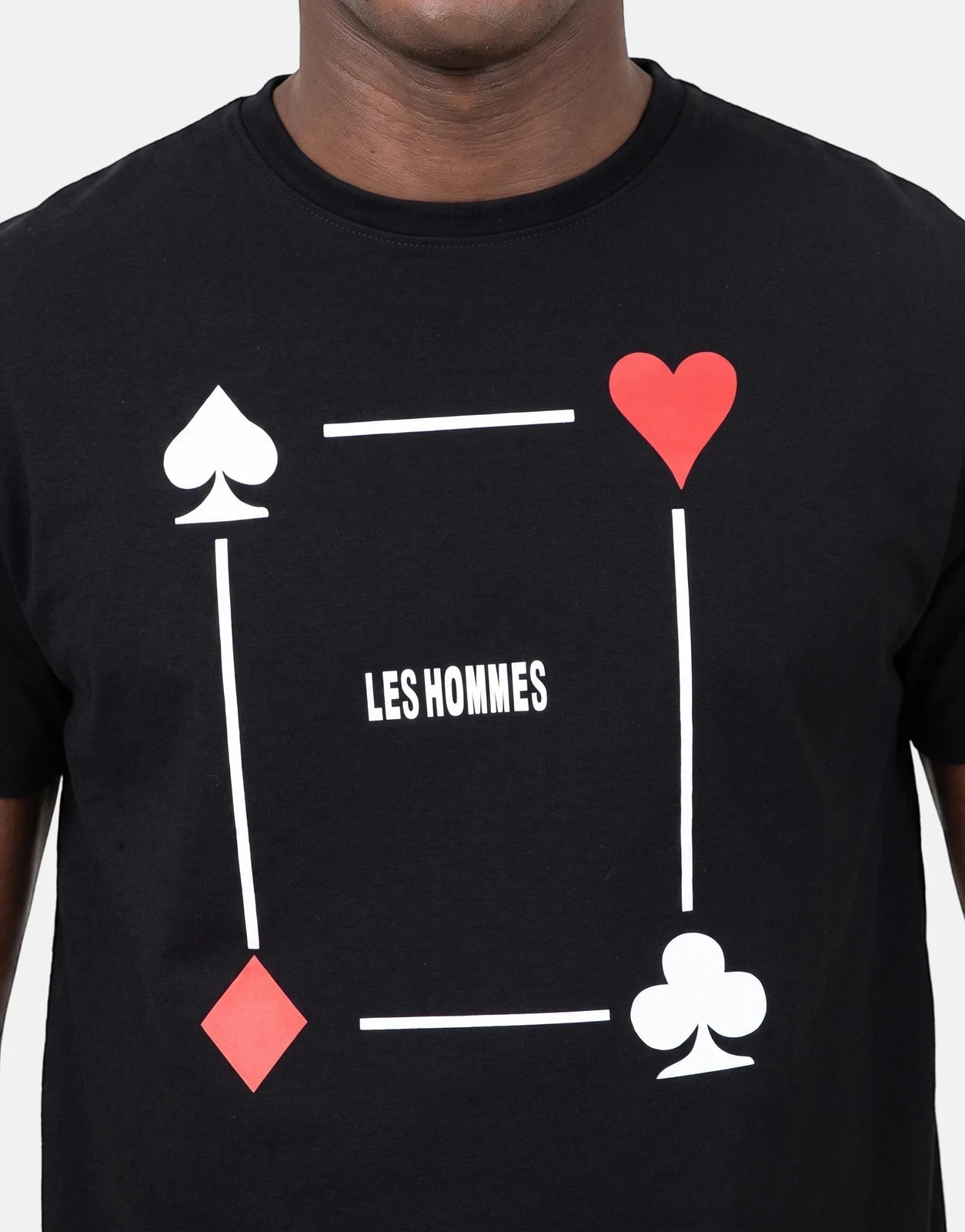 Les Hommes Poker Print Black T-Shirt, featuring red and white card suit graphics and logo, worn by a model.