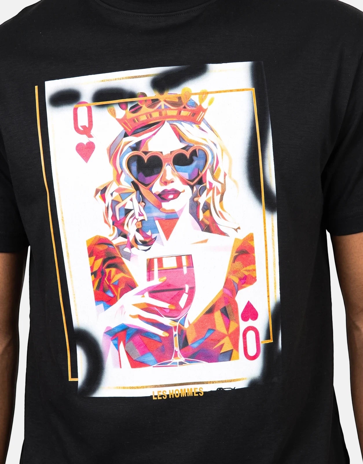 Close-up of a Les Hommes Queen Of Hearts Black T-Shirt featuring a vibrant pop-art graphic of a crowned woman in heart