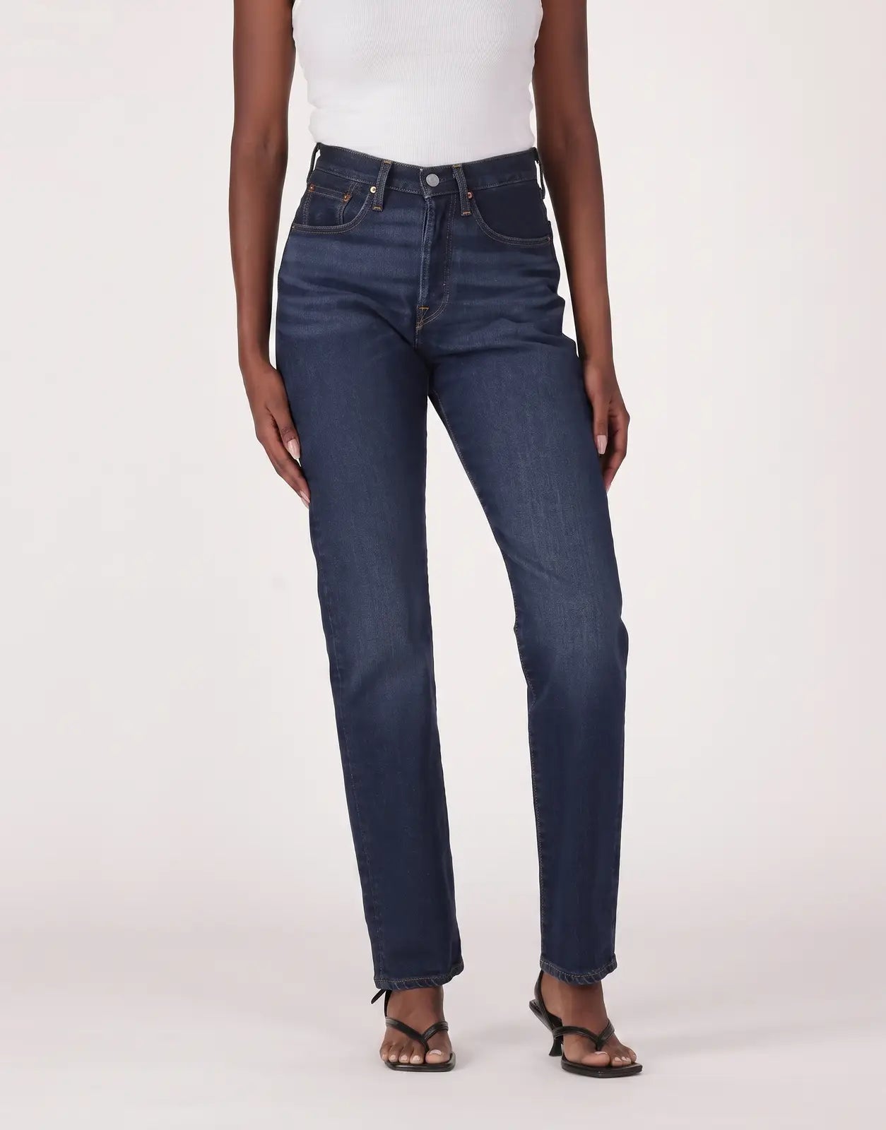 Levis 501 Ladies Time Take Jeans in a dark blue wash, featuring a straight-leg cut and classic denim construction, worn by a