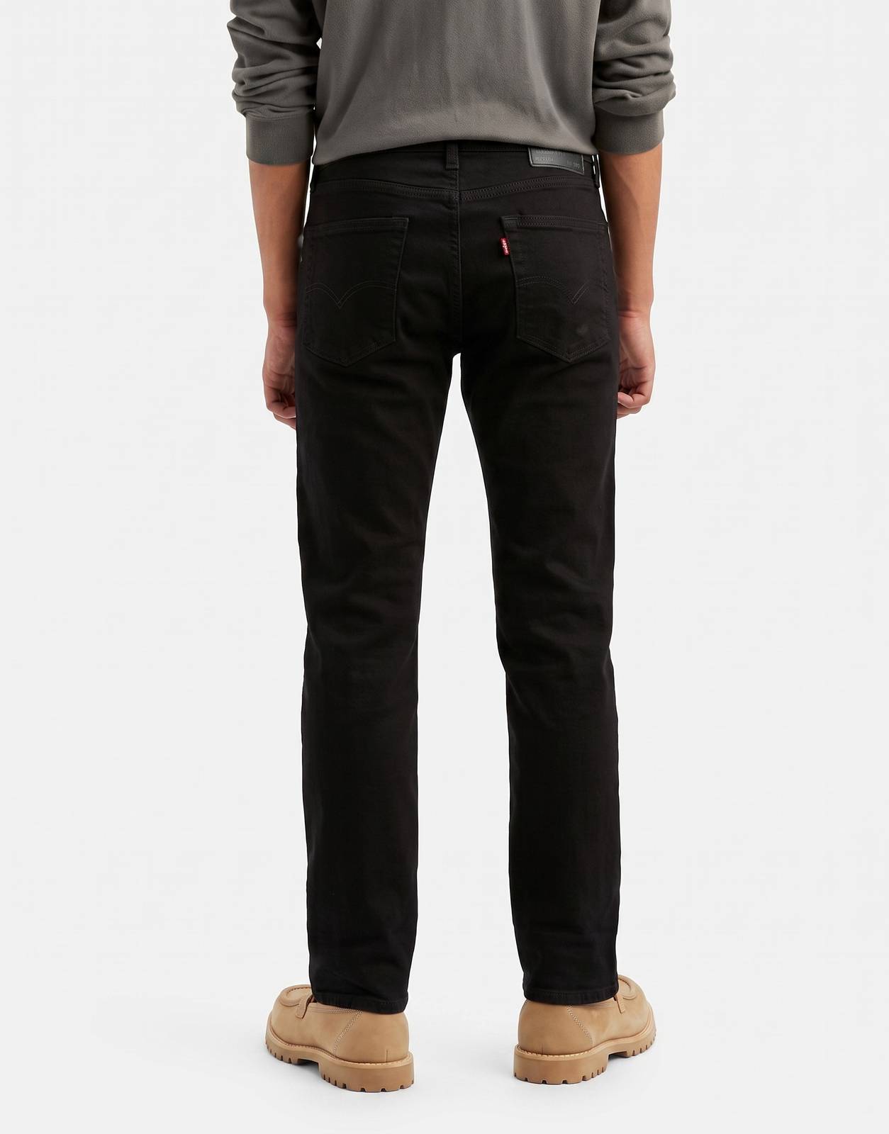 Levi's 511 Slim Black Jeans for men, styled in a classic black wash with a slim fit, shown from the back on a model.