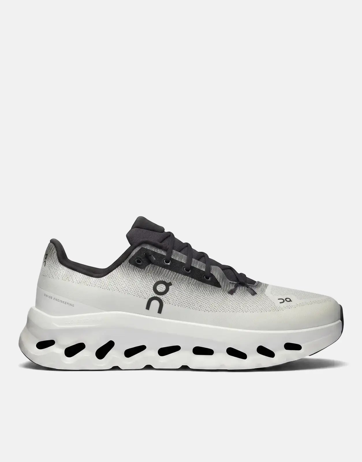 On Unisex Cloudtilt Black Ivory sneaker, featuring a white and black mesh upper and a unique white Cloudtec Phase sole, in