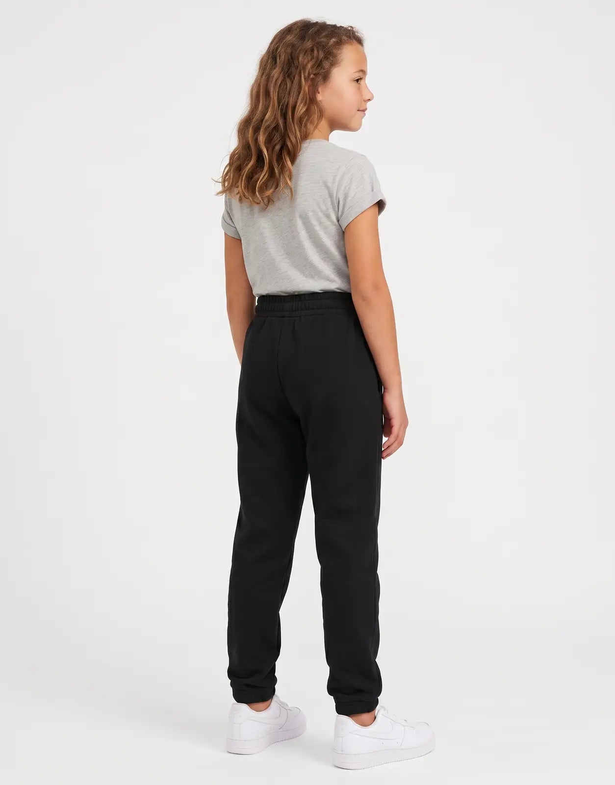 Polo Girls Hannah Embroidered Black Jogger pants, seen from the back. These comfortable black joggers feature an elastic