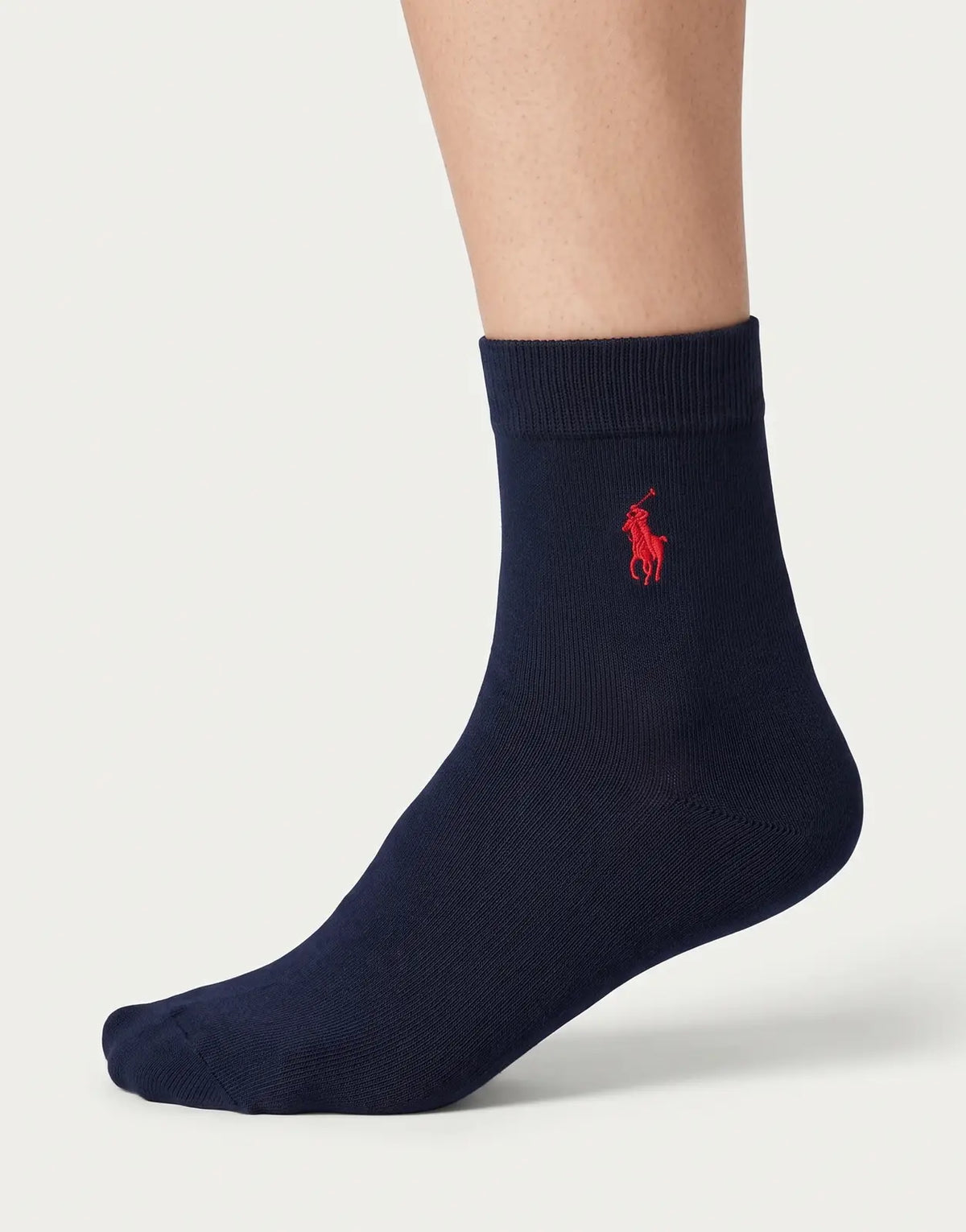 Polo plain navy ankle socks featuring a red embroidered polo pony logo at the cuff.