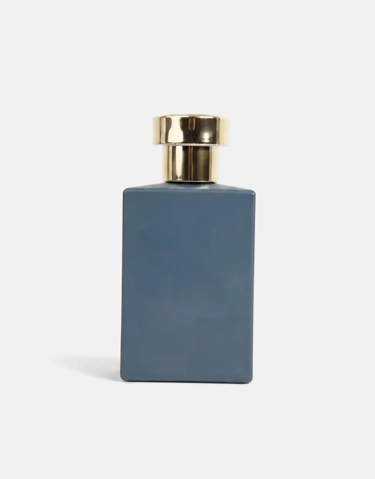 Pure Premium Assassin Perfume in a matte blue rectangular bottle with a shiny gold cap, shown front view.