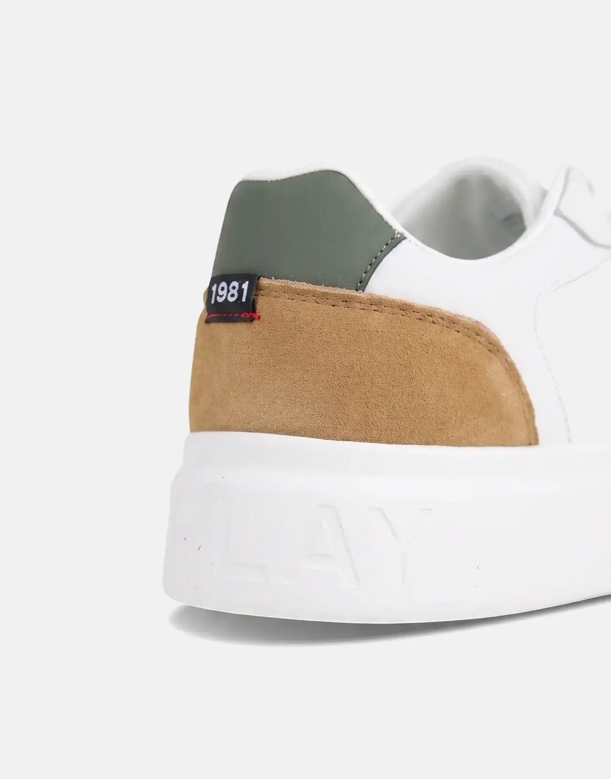 Close-up of a Replay Notting Agency white and tan suede low-top sneaker with a green heel accent and '1981' tag.