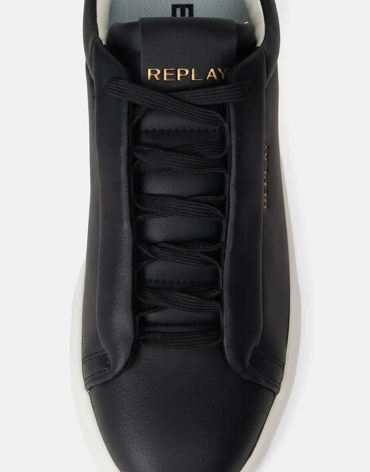 Close-up view of a single Replay Notting Medium Black Sneaker made of textured leather with black laces and a gold 'REPLAY'