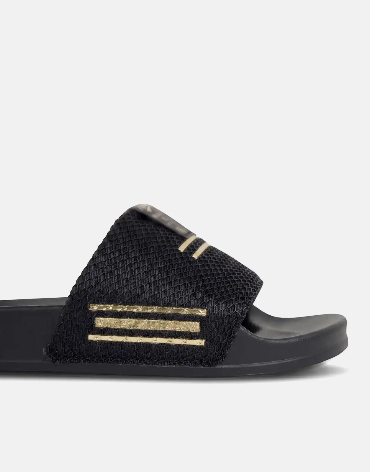 Replay Up Trap Black/Platino Slides, featuring a textured black mesh strap with gold stripes and branding, on a white