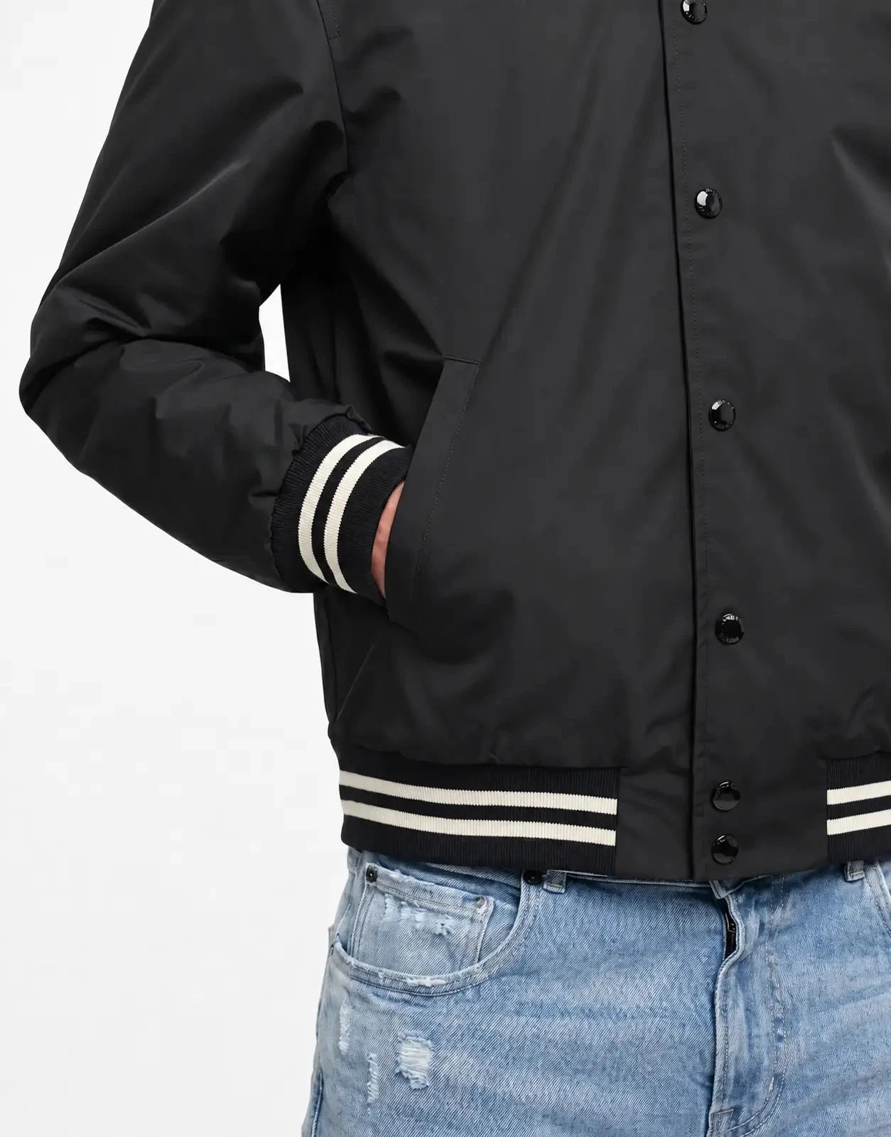 Replay Varsity Black Jacket shown from the front with snap buttons and ribbed striped cuffs and hem.