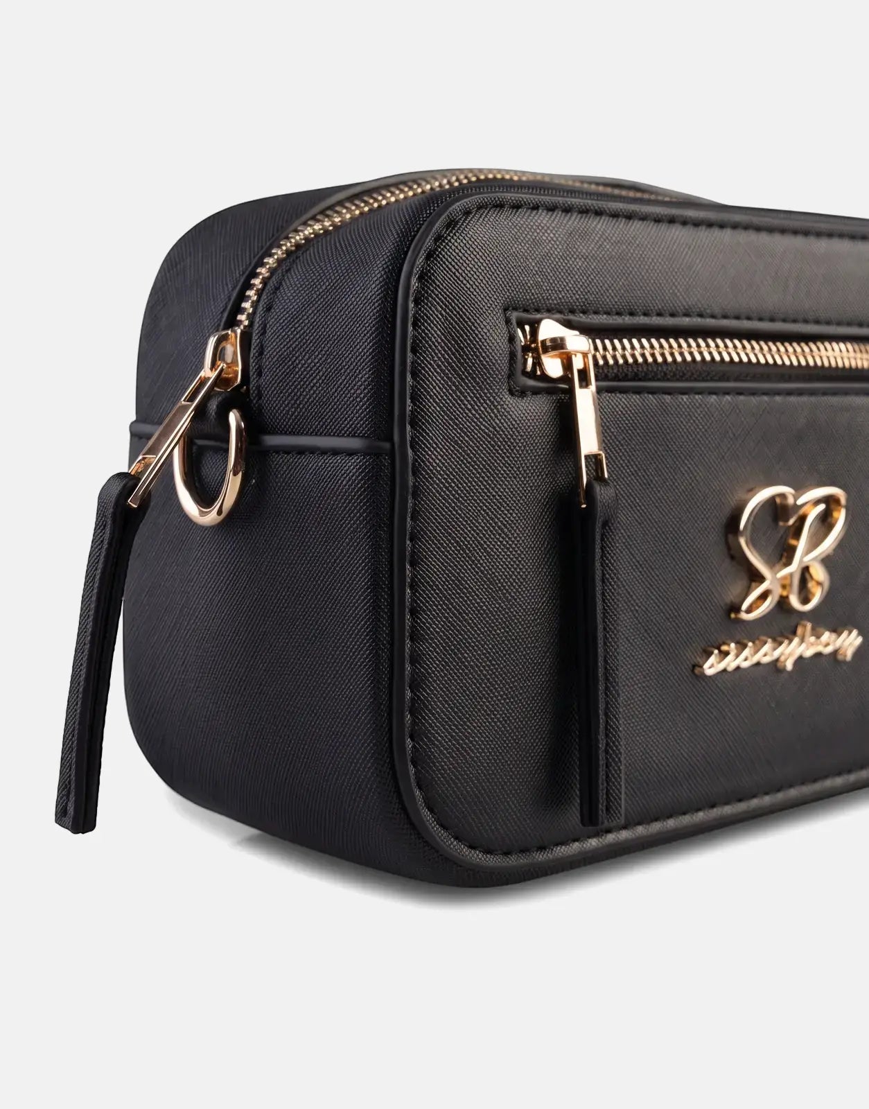 Close-up of a Sissy Boy Basic black camera bag made from textured material, featuring gold zippers and an 'SB' logo.