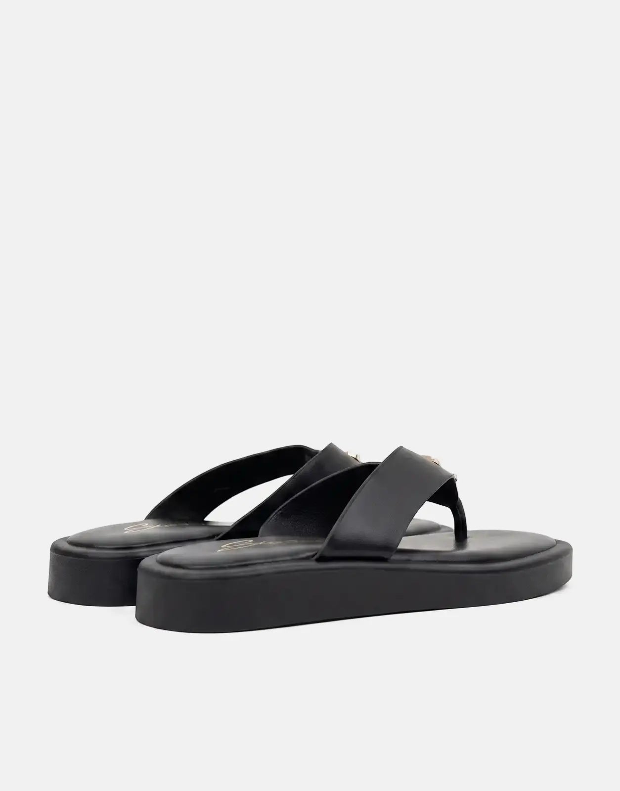 Sissy Boy Mimi black platform thong sandals with gold accents, photographed from a low angle, side view.