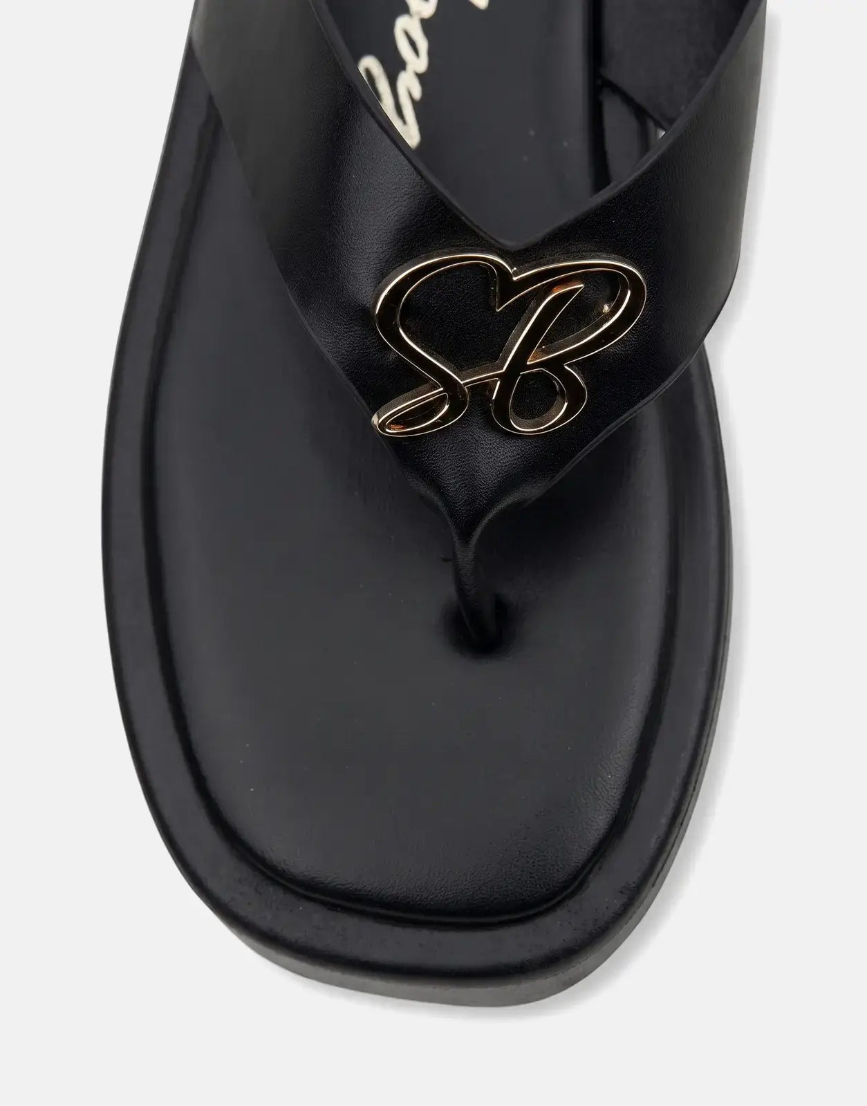 Sissy Boy Mimi black thong sandals with a gold SB logo detail, featuring a smooth finish and a top-down view.