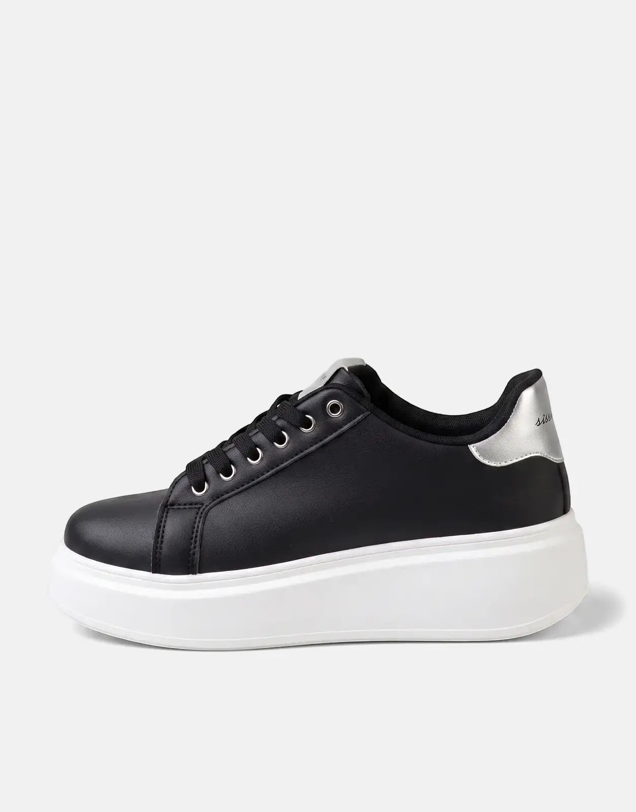 Sissy Boy Noella black women's sneakers with a thick white platform sole and silver heel detail, shown in a side view.