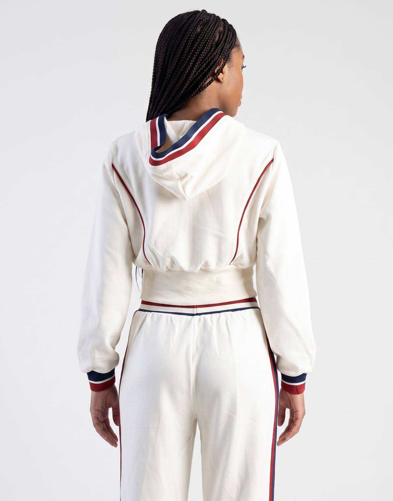 Sissy Boy Off Your Game Sweatshirt and matching track pants, off-white with red and blue striped trim, worn by a model, seen