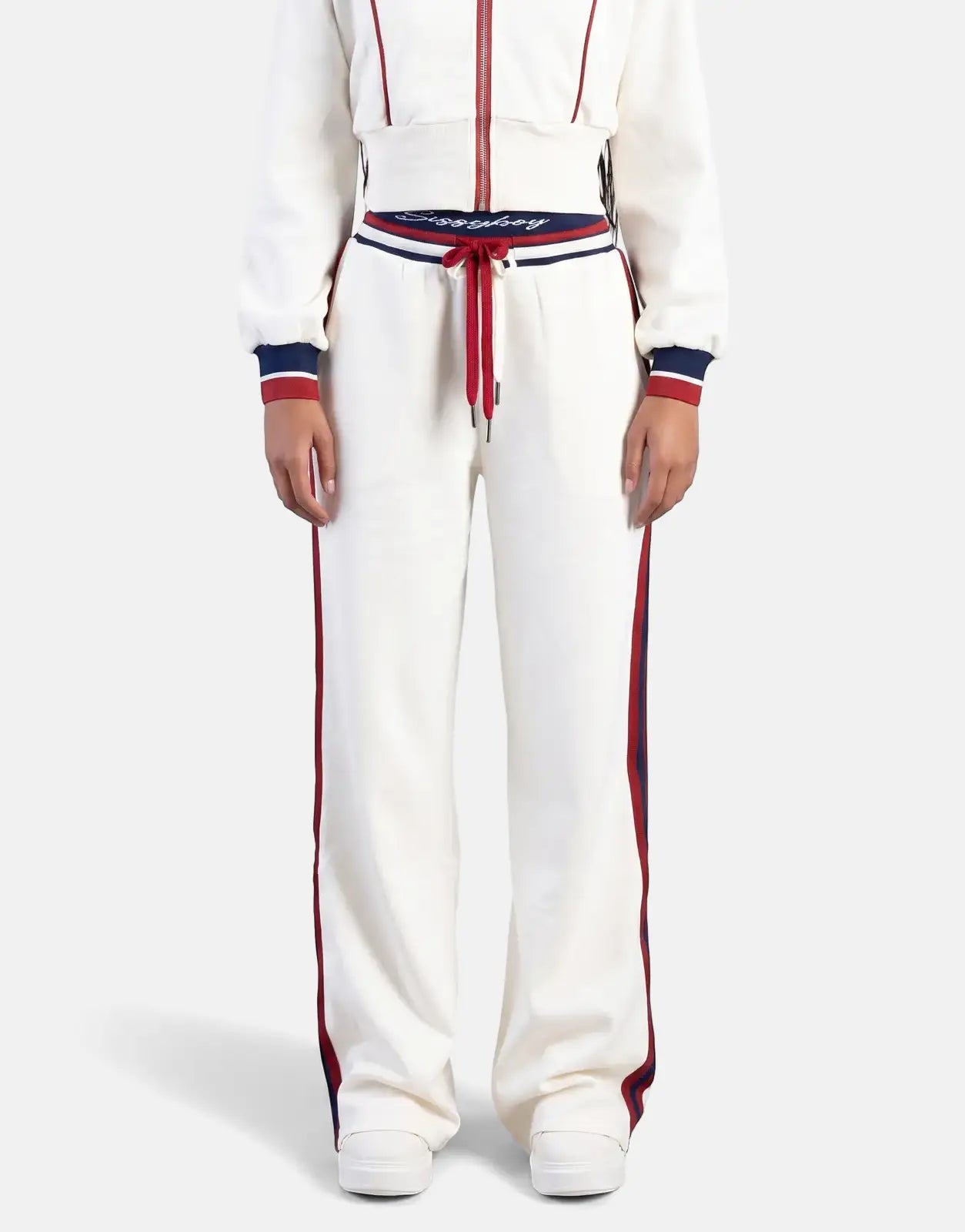 Sissy Boy Off Your Game white wide leg sweatpants and matching cropped track jacket with red and navy stripes.