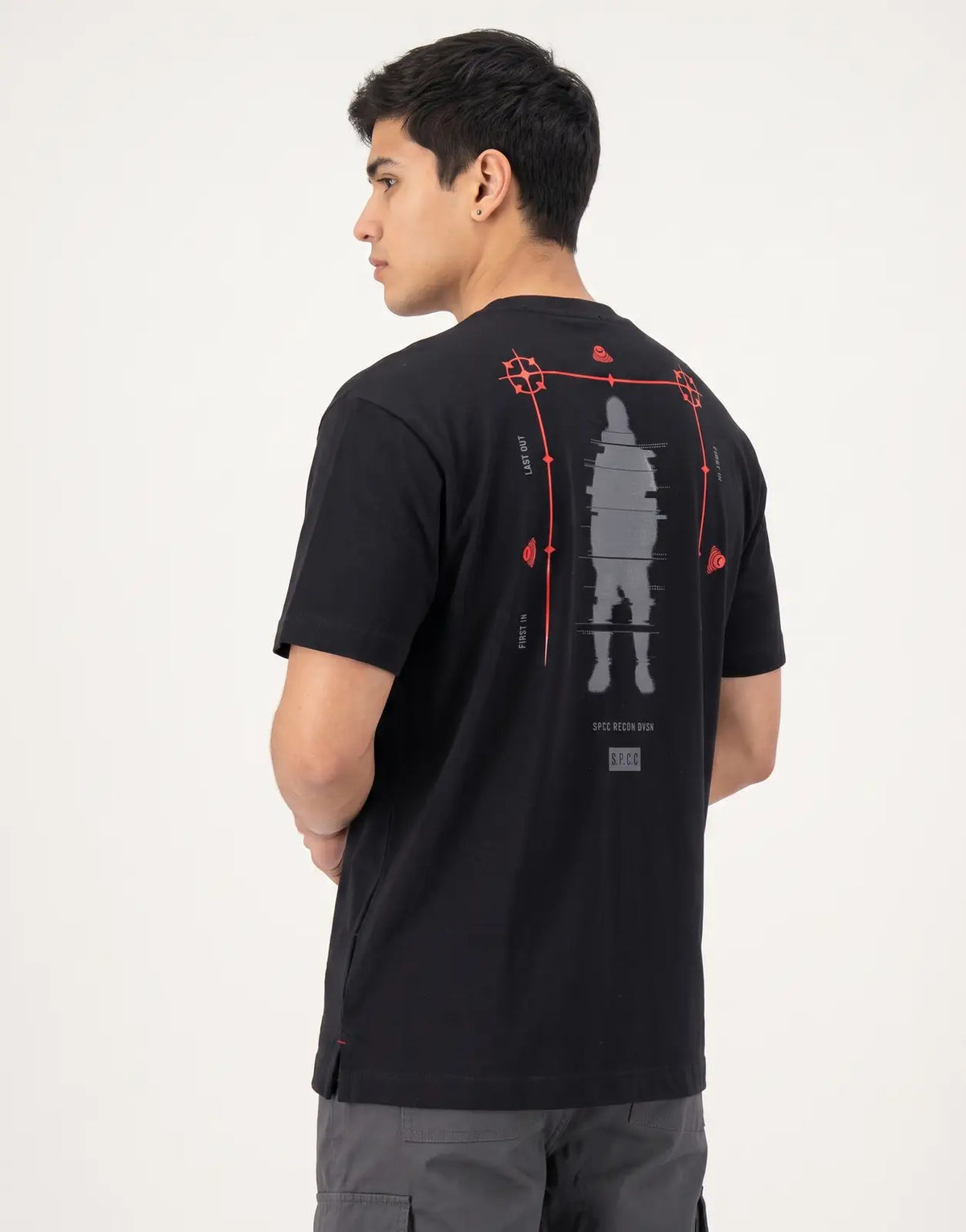SPCC Recon Overwatch black t-shirt for men, featuring a unique grey and red graphic print on the back, shown worn by a model.