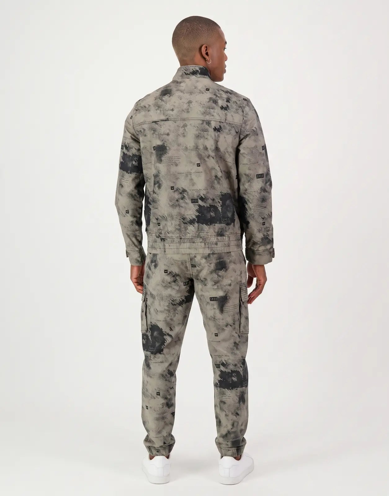 SPCC Ronan Stone Jacket for men, featuring a grey and black abstract camouflage pattern, shown from the back view.