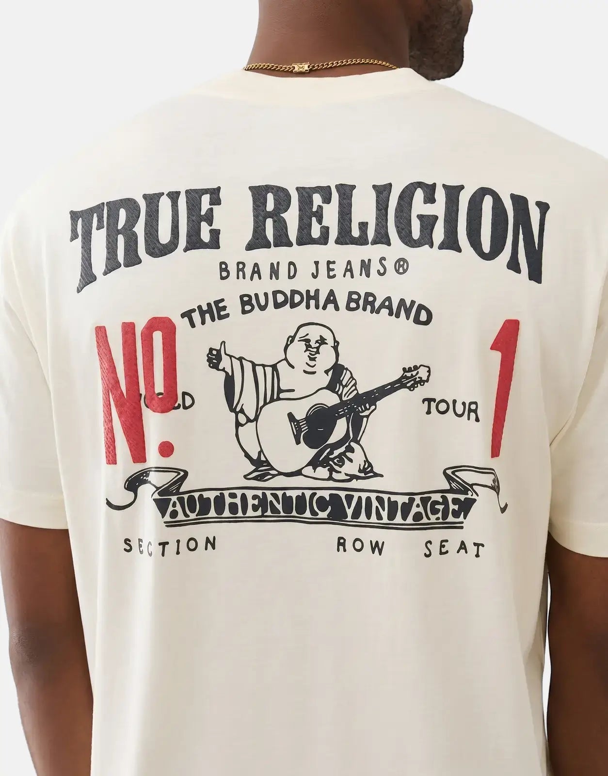 Back view of a men's True Religion Number One SRS T-shirt in off-white with a black and red graphic print.