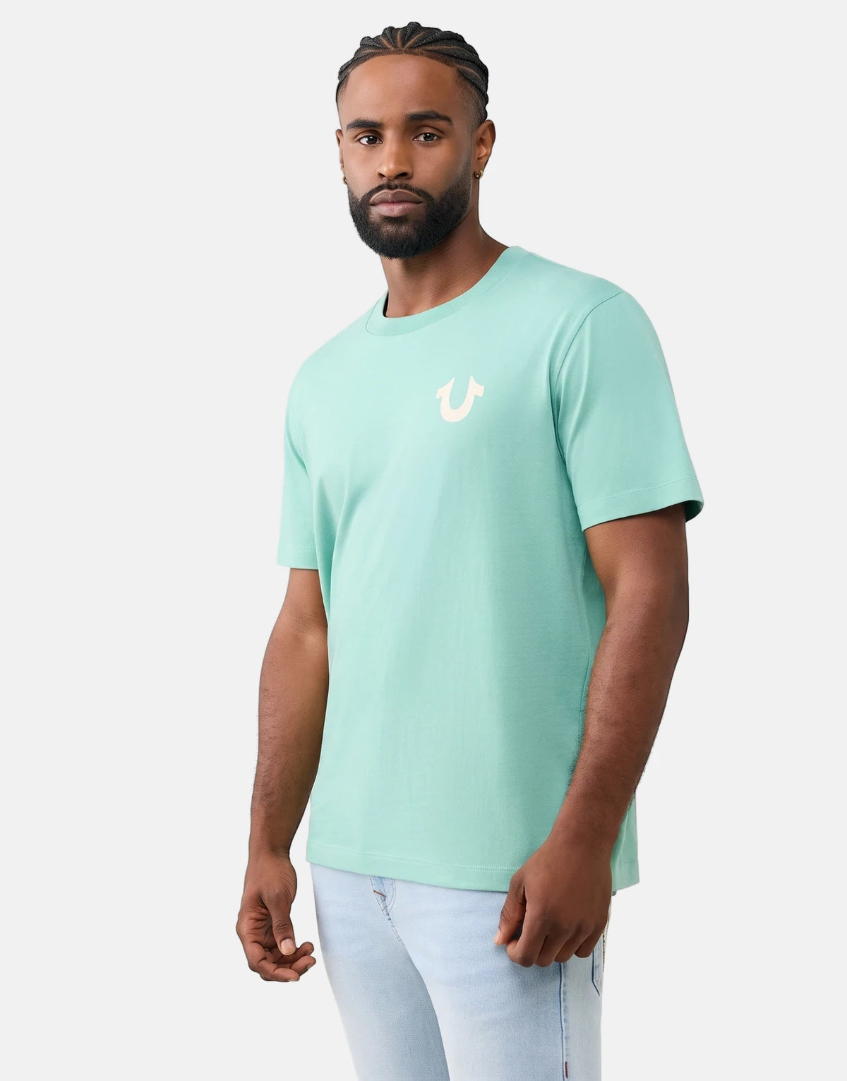 Male model wearing a True Religion short sleeve Beryl Green crew neck t-shirt with a horseshoe logo.